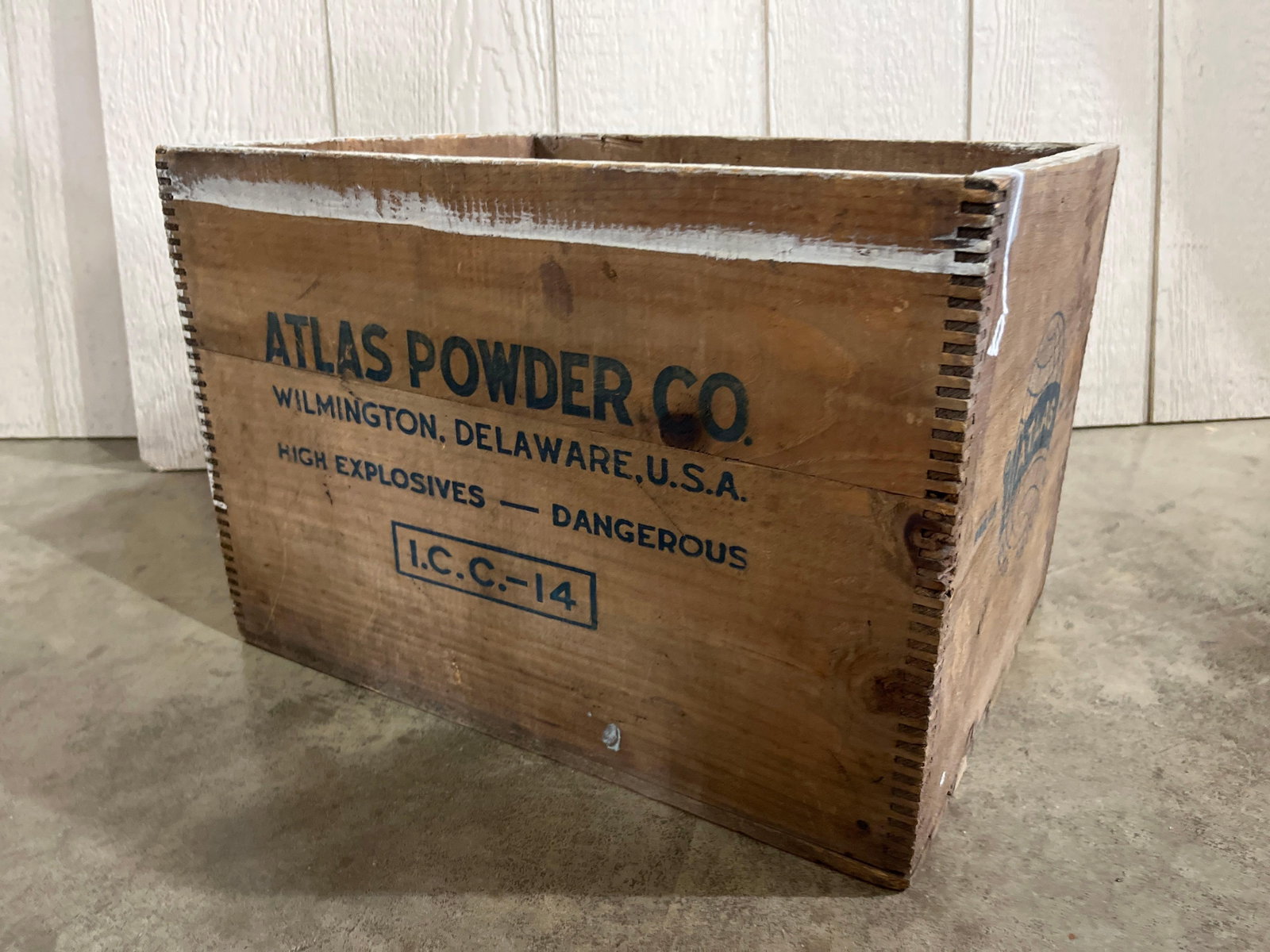 Atlas Powder Co. High Explosives Crate: 17.5x13.5x12 This vintage industrial wooden shipping crate was manufactured for the Atlas Powder Company, based in Wilmington, Delaware. The crate is constructed of wood with finger-jointed (box