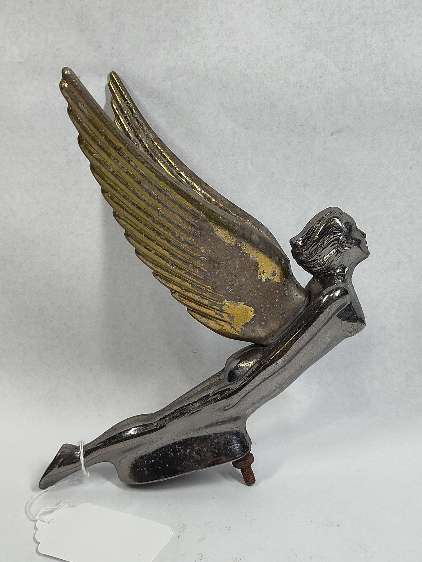 Packard Goddess of Speed Hood Ornament: 9x9 An original vintage automotive mascot in the Goddess of Speed design, attributed to the Packard Motor Car Company. This Art Deco piece features a stylized female figure in a forward-leaning,