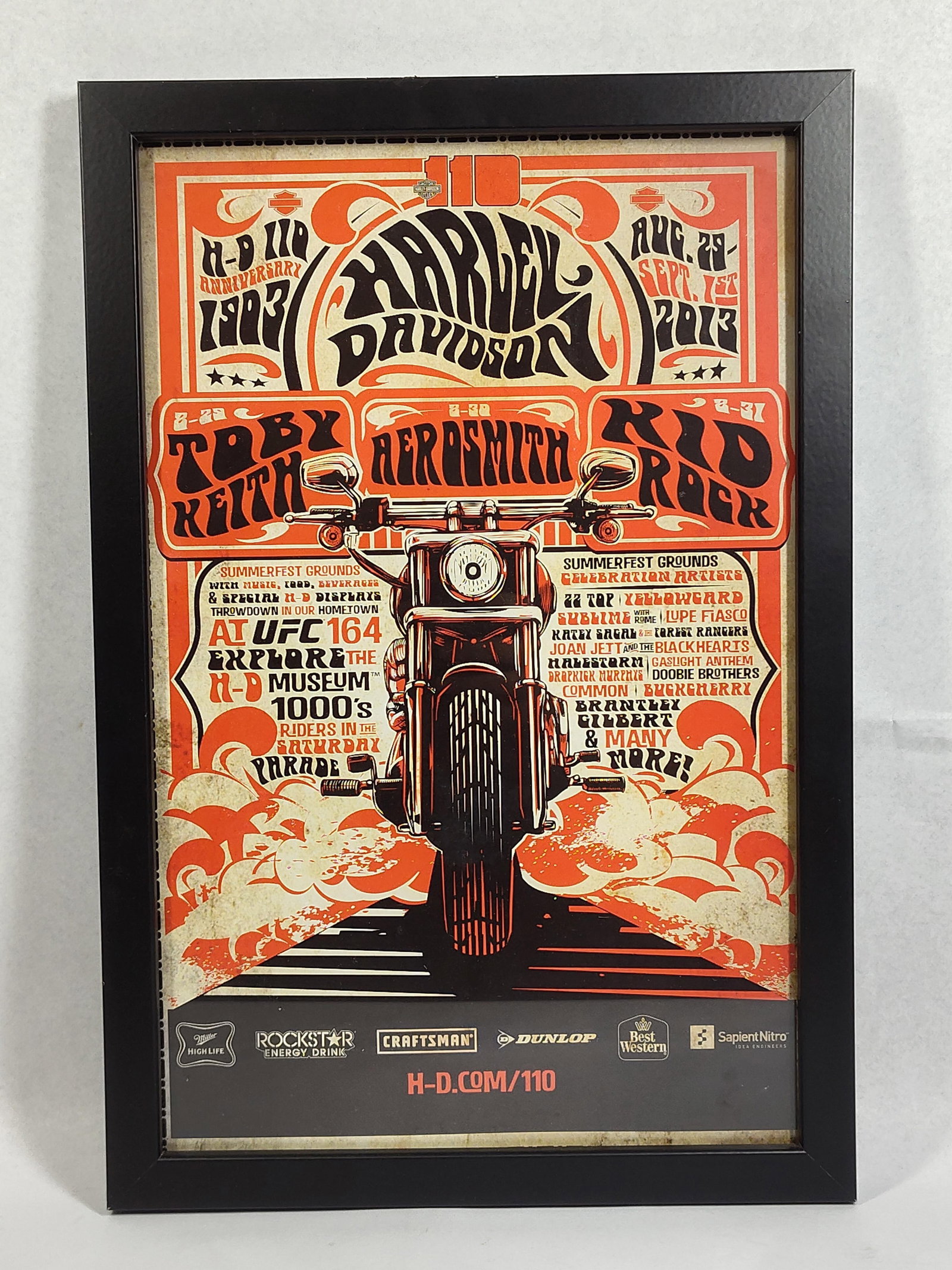 Harley-Davidson 110th Aerosmith Poster: 18x12 This commercial print is a commemorative event poster for the Harley-Davidson 110th Anniversary celebration held August 29 to September 1, 2013, in Milwaukee, Wisconsin. The graphic design