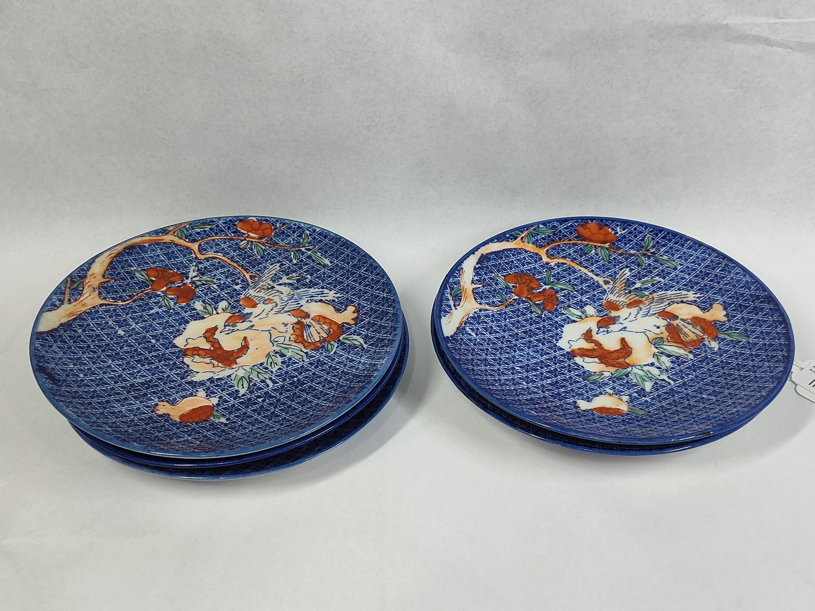 5 Japanese Imari Bird & Flower Plates: 8.5in dia. A set of five Japanese porcelain plates dating to the late 19th century, during the late Edo or early Meiji period. The plates are decorated in the Imari style, featuring a central bird and