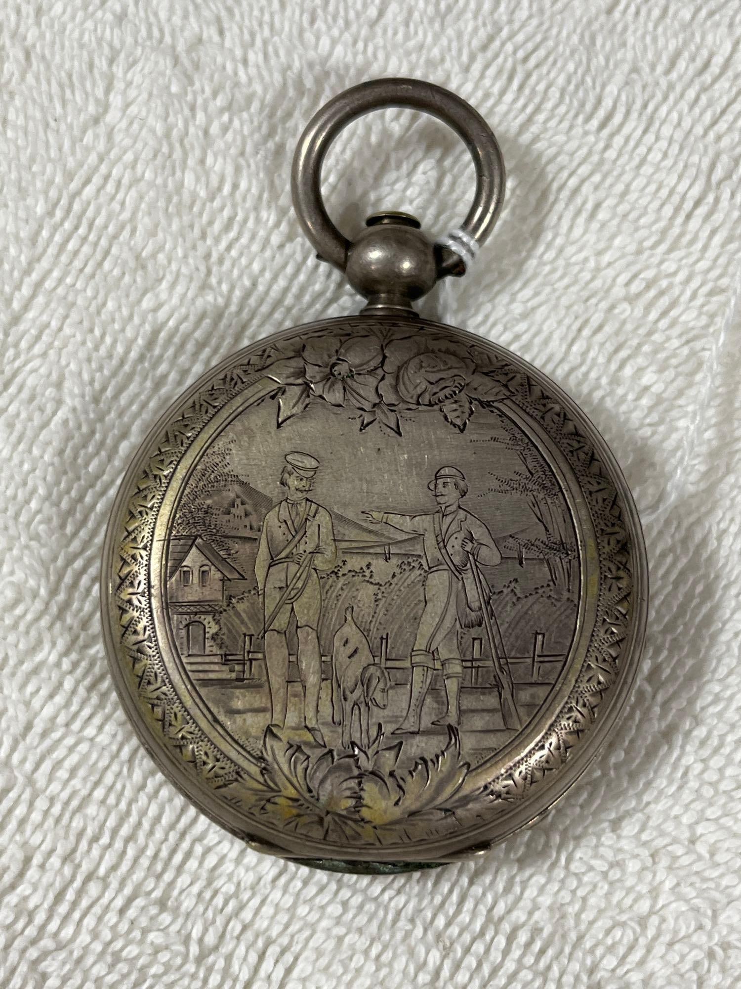 Highly Engraved Pocket Watch Case: Farm scene and two hunter with dog can be seen on this pocket watch case. Inside hunter case is engraved with owners name. This is a case only. 