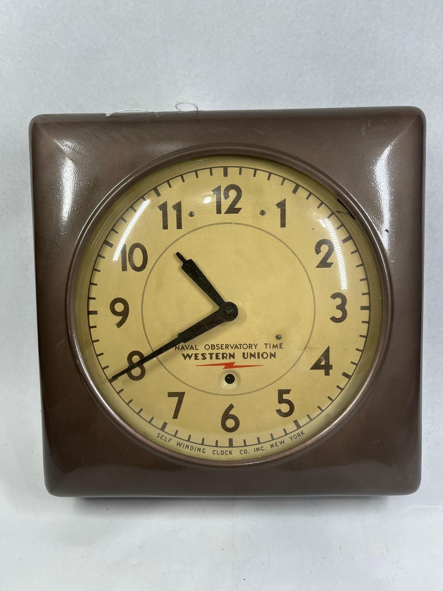 Western Union Self Winding Wall Clock: 15x15x4 A vintage square metal wall clock manufactured by the Self Winding Clock Co., Inc., of New York. This clock was utilized as part of the Western Union telegraphic time service, featuring a