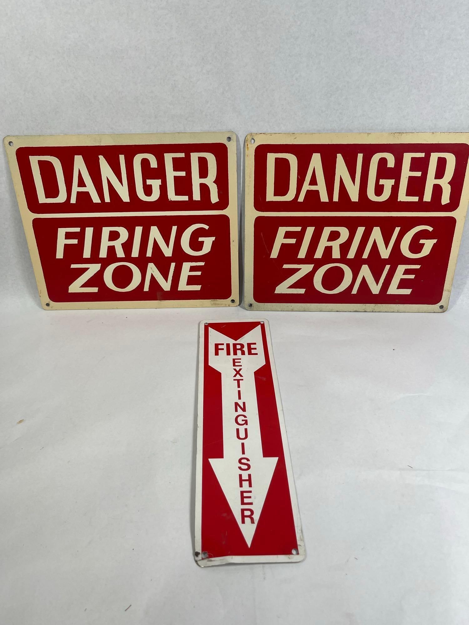 3 American Industrial Safety Signs: A collection of three vintage industrial safety signs of United States origin. The lot includes a matching pair of rectangular warning signs and one vertical directional arrow sign. The pair of signs