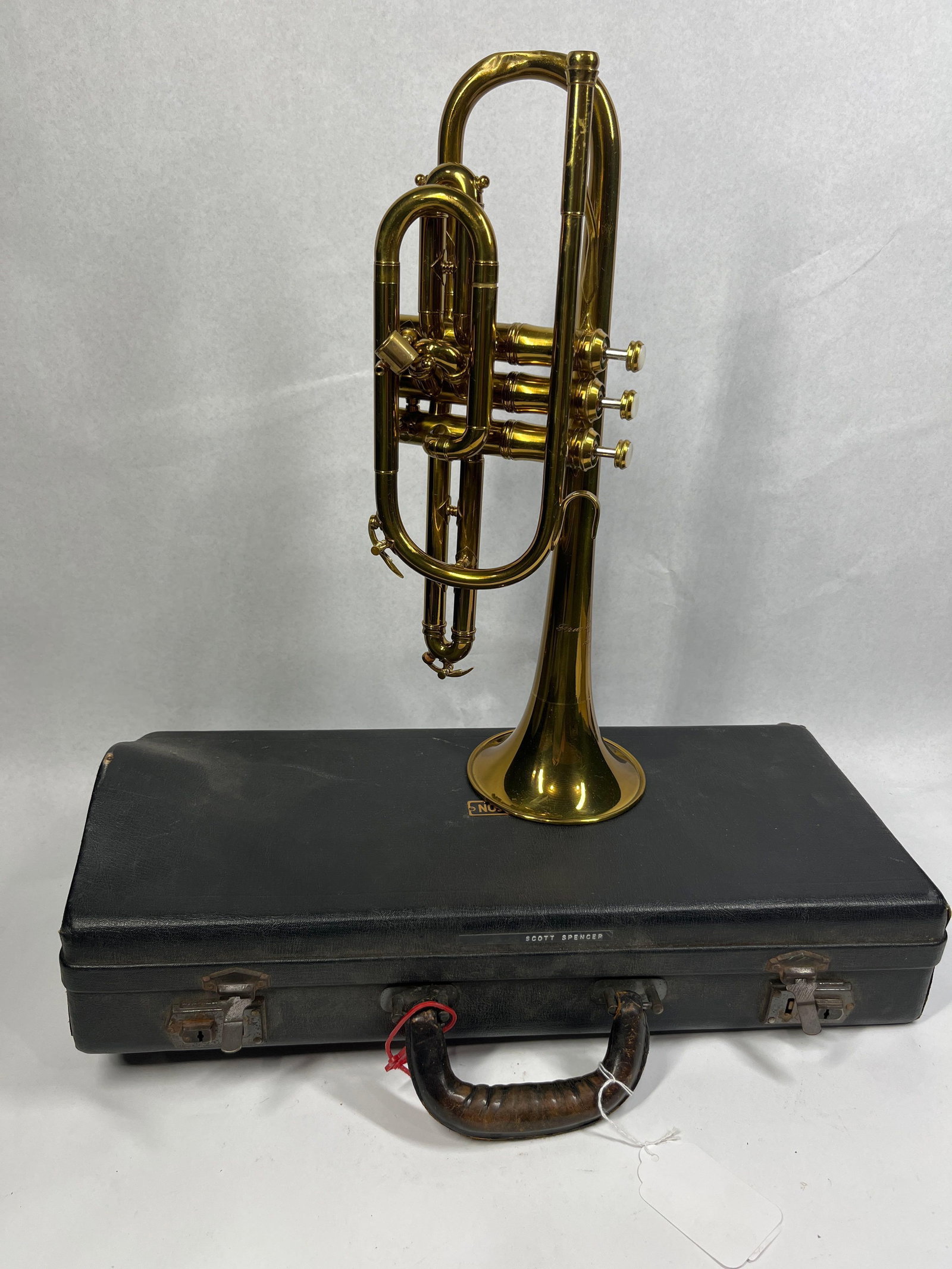 Frank Holton & Co Brass Cornet w/ Case: This vintage brass cornet was manufactured by Frank Holton and Co. in Elkhorn, Wisconsin. Based on the manufacturer serial number 156576, the instrument dates to approximately 1944?1945. Visually