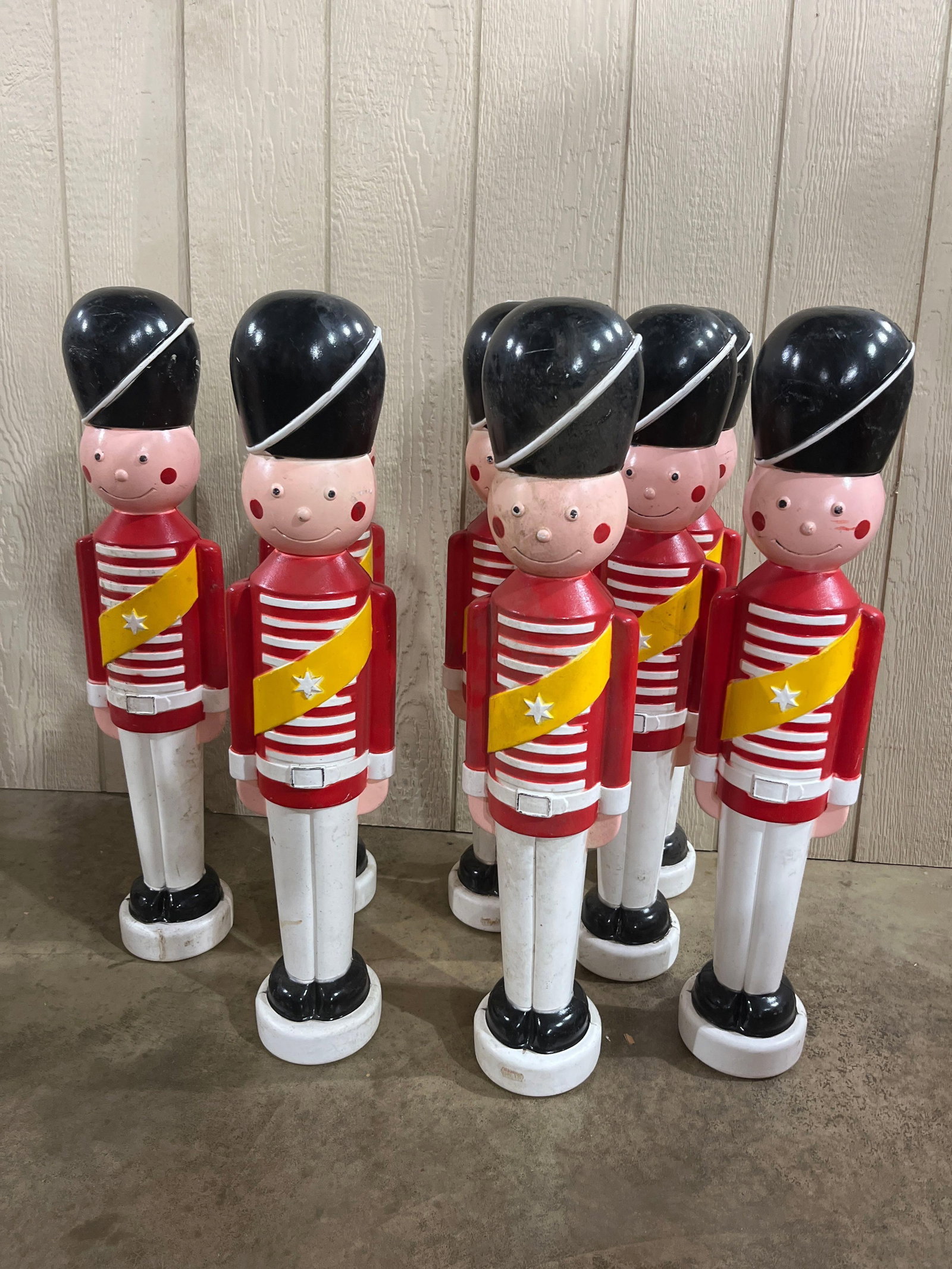Attr TPI 7 Blow Mold Toy Soldiers: 32in A set of seven vintage holiday lawn decorations modeled as British Royal Guardsmen. These figures are constructed from blow-molded plastic and feature a decorative scheme including red tunics