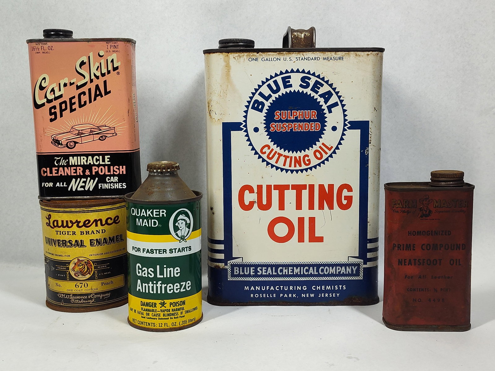 Auto & Industrial Lithographed Cans: This collection consists of mid-century American containers manufactured for automotive maintenance and industrial shop use. The group includes a variety of shapes including rectangular utility,