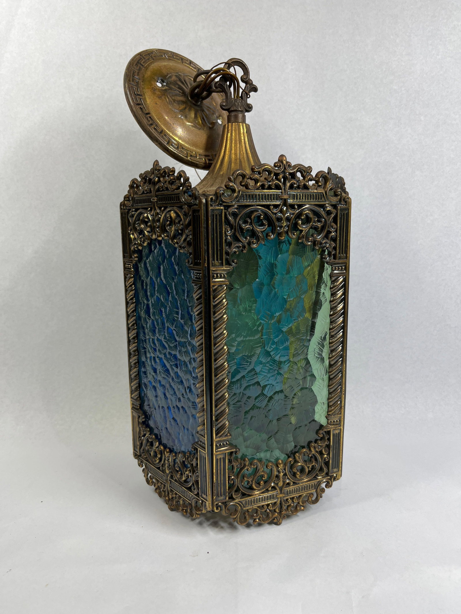 Progress Lighting Spanish Glass Lantern: 14x8x8 This vintage hanging pendant lantern is manufactured by Progress Lighting, identified by a paper label and an Underwriters Laboratories Inc. sticker (Issue No. E-276,052) located inside the cei