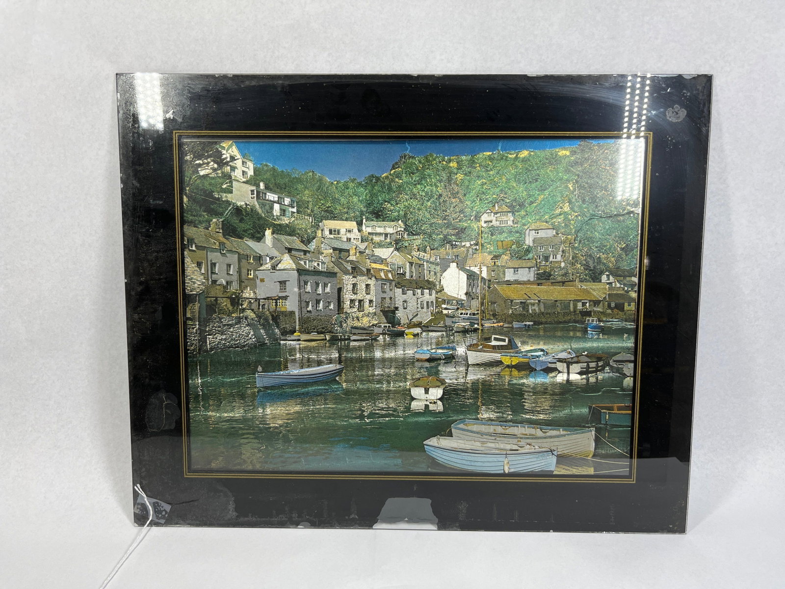 Foil Art on Glass, Polperro Harbor: 16x20 This vintage foil art print is attributed to June Mazzie Enterprises or Dufex and depicts a picturesque coastal scene identified as Polperro Harbor in Cornwall, England. The print utilizes a