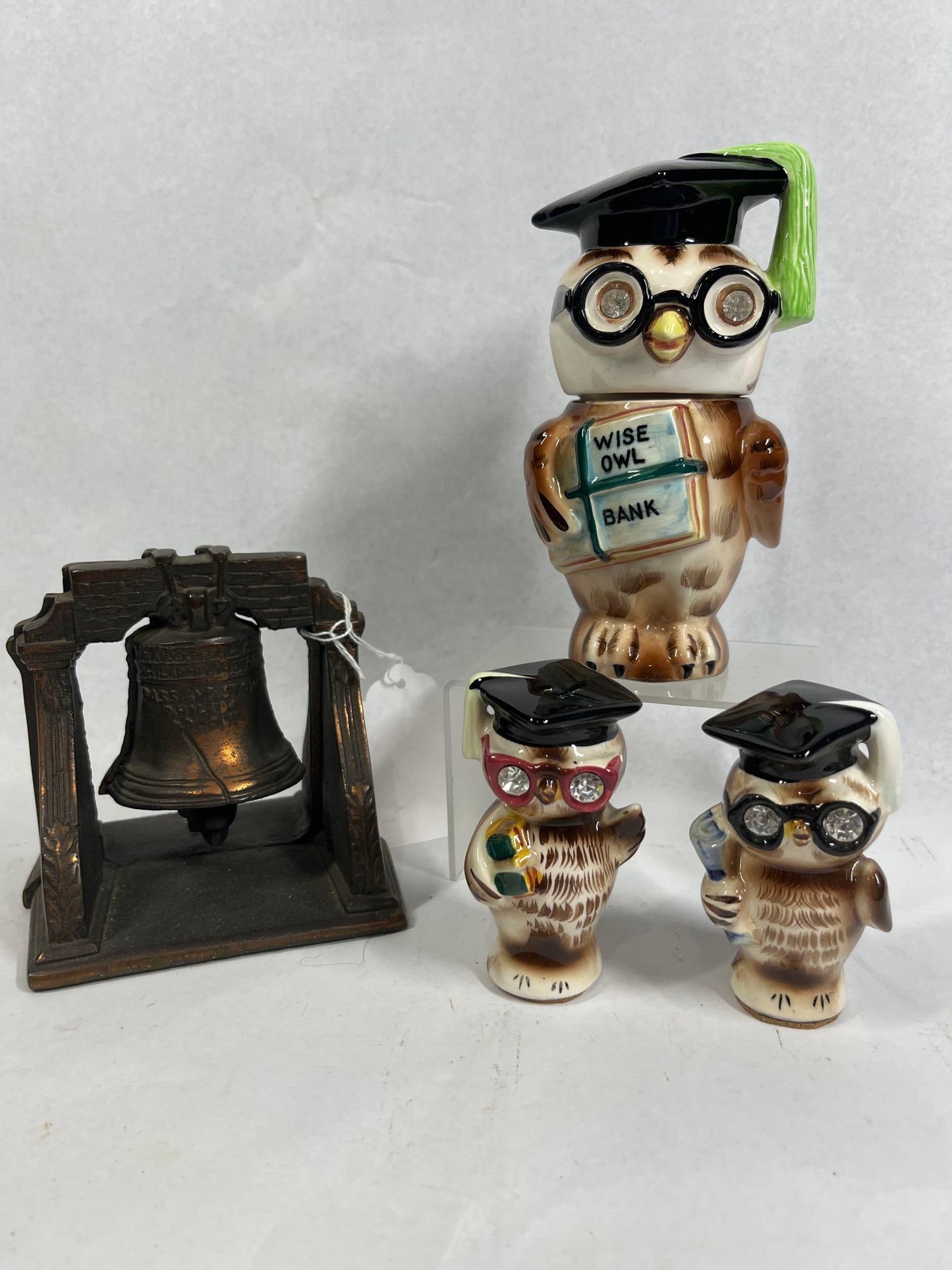 Lefton Owl Set & Liberty Bell Bookends: 5x2x5 This assortment features a three-piece ceramic graduation owl set by Lefton and a pair of Americana-themed bookends. The Lefton set includes one large coin bank and matching salt and pepper