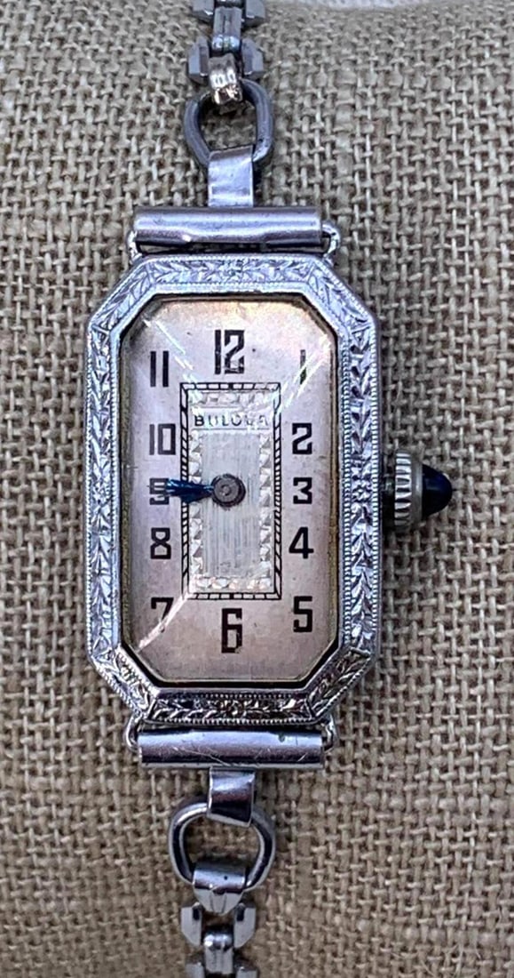 Working 1924 Art Deco Radiant 14k Rolled Gold BULOVA Ladies Wristwatch: Classic Art Deco styling, original domed crown is present, 14k rolled gold stamped interior, convex crystal, large octagonal openwork link chain, hinged clasp with ratchet lengthener and snap clo