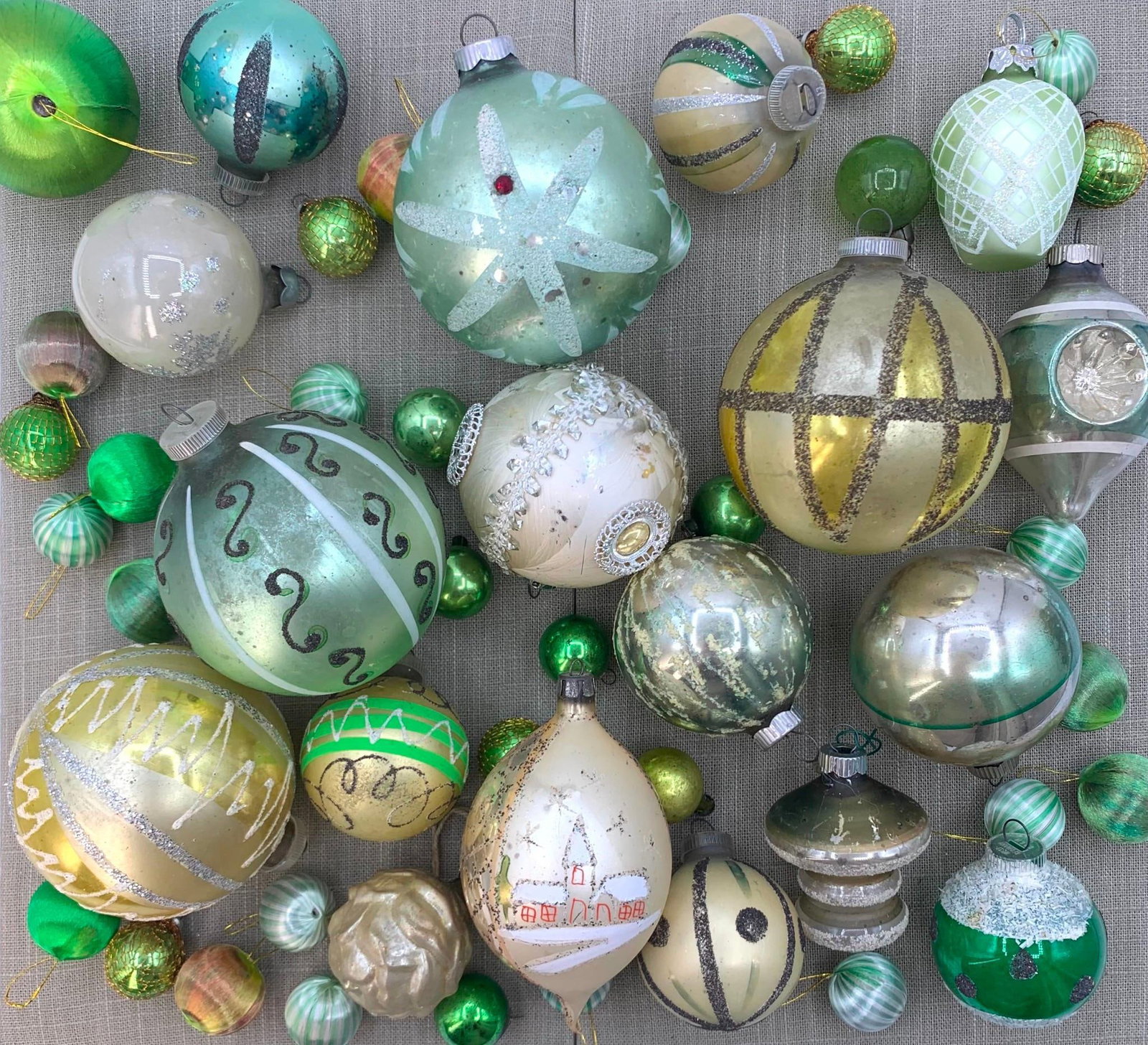 50 Vintage West Germany, Poland, Shiny Brite Moss Green, Champagne & Lime Mercury Glass Ornaments: Fantastic variety of antique to vintage ornaments, from 7/8" to 4 1/4", 19 satin wrapped spheres in the mix of glass, West Germany, Poland and Shiny Brite caps.