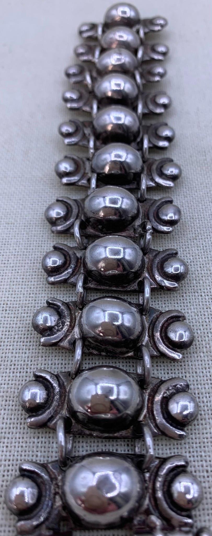 83.9 Gram 800 SILVER Vintage Domed Link Panel Bracelet: Beautifully crafted, hefty 83.9 gram weight, working slide pin closure, tested 800 Silver, 7 1/4" length x 1 3/8", drilled holes for a safety chain which is Not present.