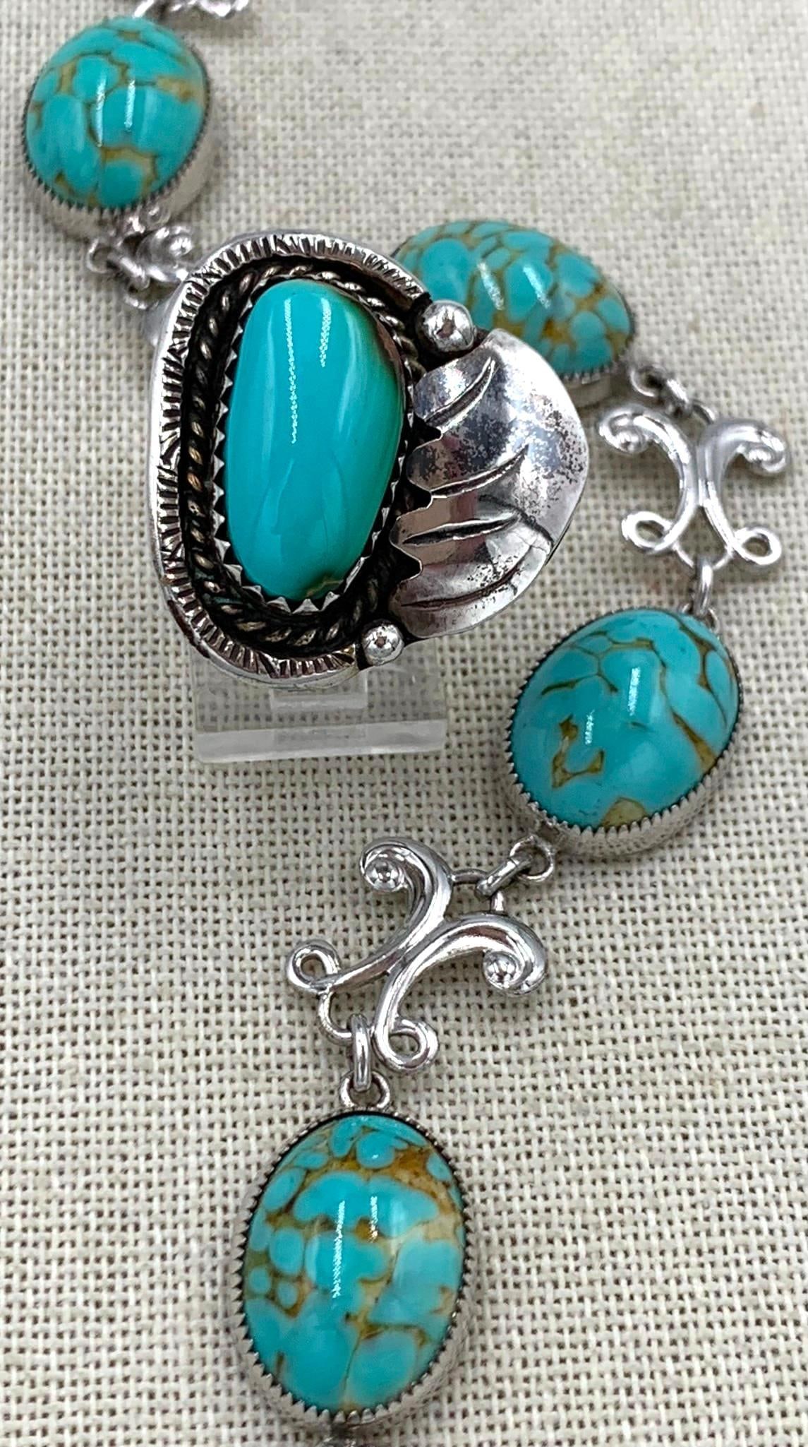 Vintage Native American Indian Crafted Sterling & Turquoise Ring & MCM AMCO Sterling Bracelet: * size 6 ring, 10.07 gram weight, 18x10mm baby blue Turquoise? * AMCO Sterling hallmark, 7 1/2in34; length bracelet, oval art glass cabs, openwork links, 16.26 gram weight