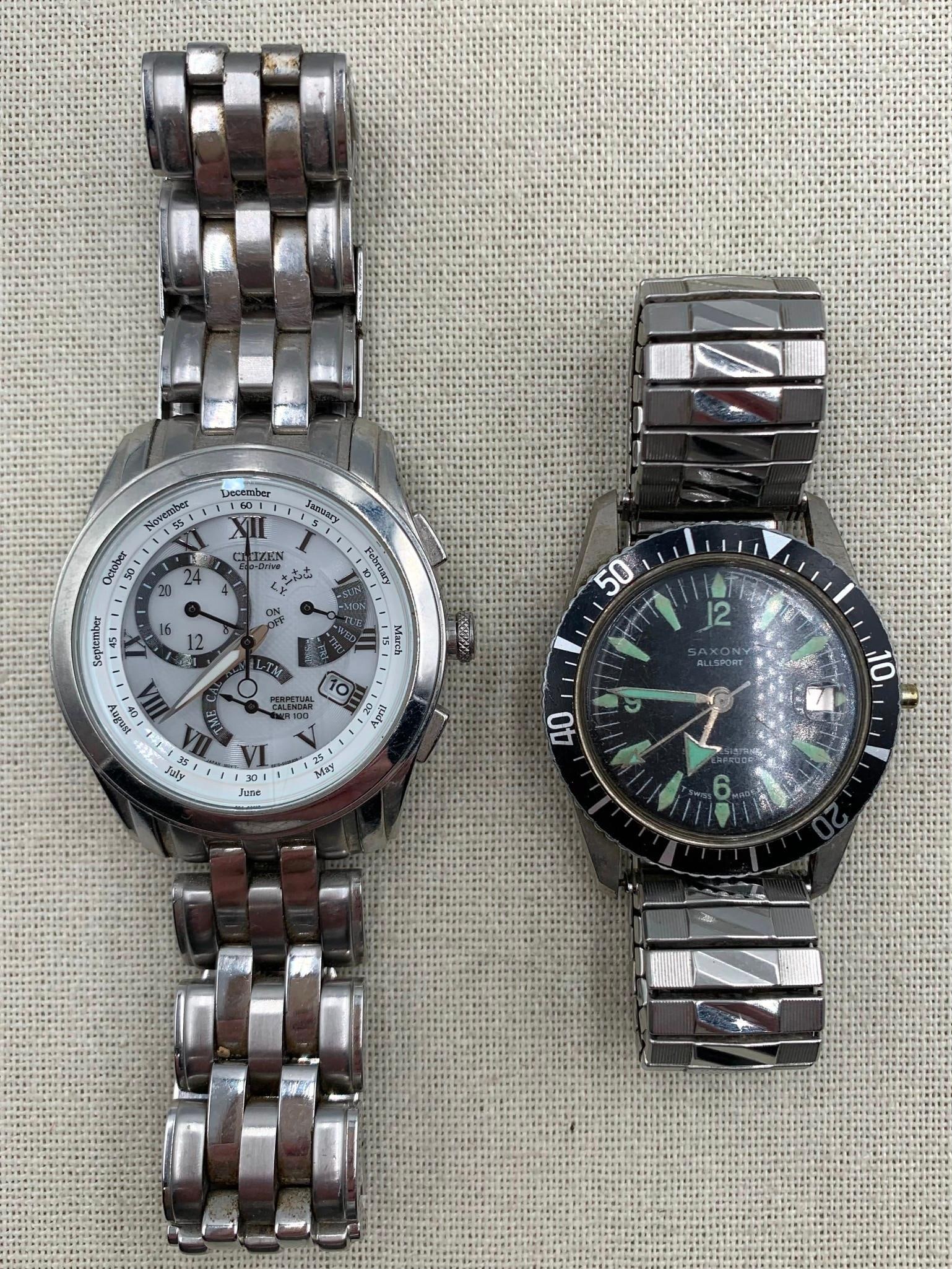 2 pc Men's Citizen Eco Drive Calibre 8700 & Vintage Saxony Allsport Glow in the Dark Watches: * Menin39;s vintage Saxony Allsport, magnified day, absent crown, Mid Century stretch band, Swiss * Menin39;s Citizen Eco Drive Calibre 8700 with a perpetual calendar, 39mm, Citizen band, hefty in wei