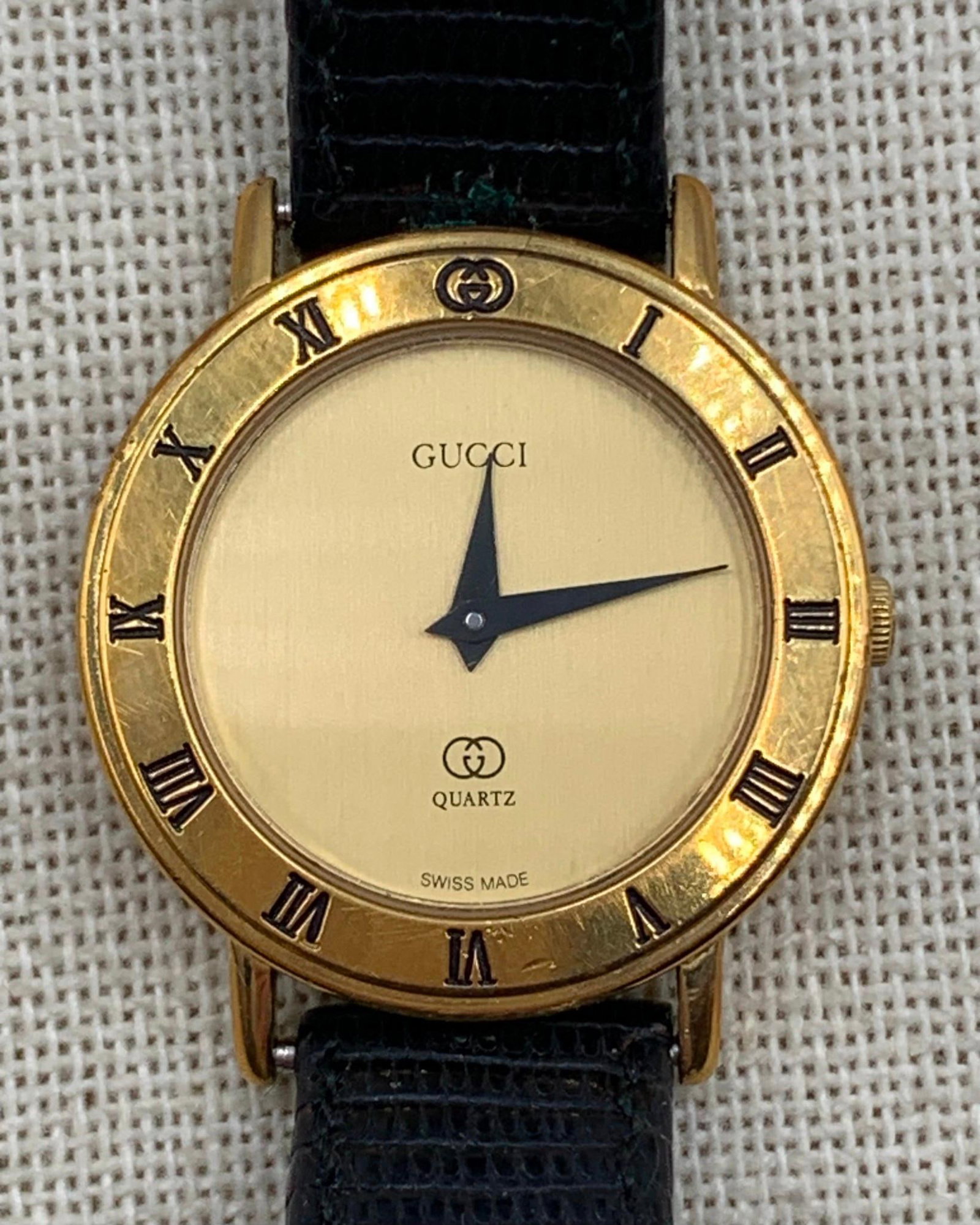 18 pc Vintage Gucci, Benrus, Sheffield, Legant, Wedgefield, Defender, Watch Collection: Helbros, Bulova, Rushmore Black Hills Gold, Geneva Elite along with the makers listed above, one absent back plate, the Deco Hamilton has no hands, one watch has a matching bracelet, the quartz models