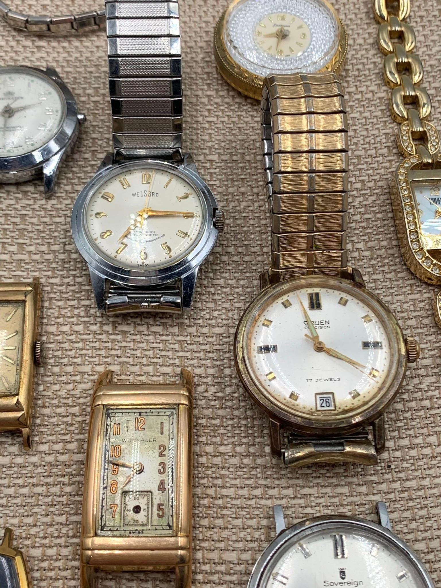 18 pc Vintage Welsbro, Gruen, Deauville, Benrus, Harvester, Waltham, Wittnauer, Watch Collection: Crown USA, 10k gold filled Wittnauer, Eastman, Sovereign, Orvin 21 Jewel, Benrus rolled gold plate with Gold Filled Top and Back over 800 Silver (no crystal) Timex, Elgin and the makers noted above, q