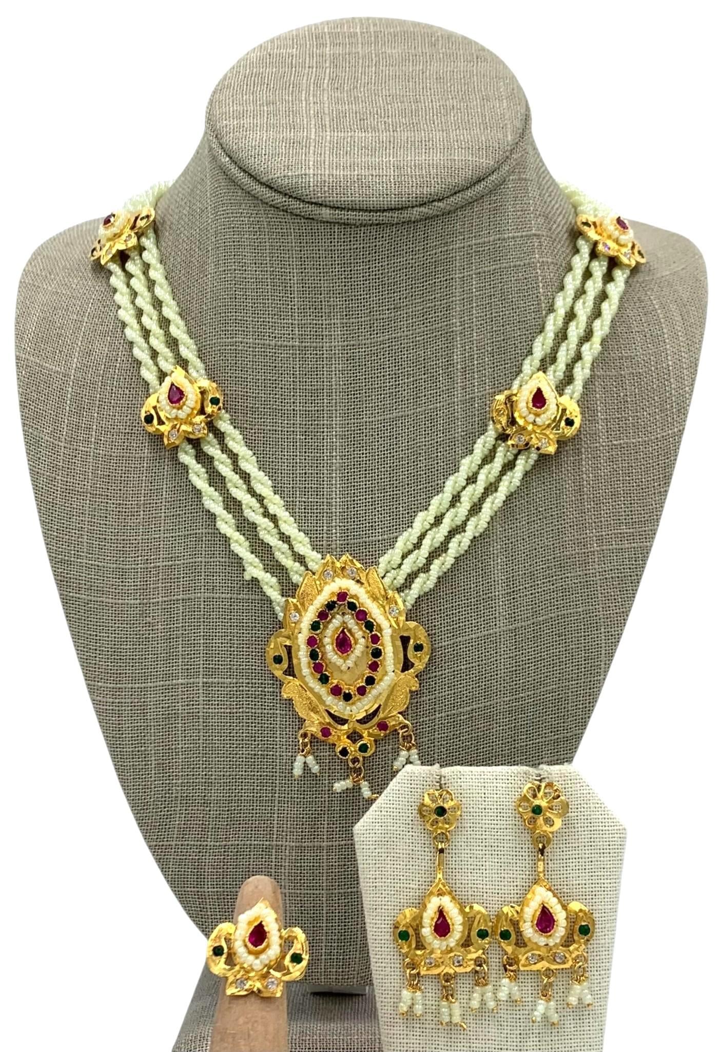 Opulent Kundan Polki Seed Bead ecklace, Earrings & Ring Demi Parure Jewelry Set in Velvet Case: Expertly crafted with 6 woven strands of custard glass seed beads, gold plated metal framework, sparkling faux Rubies, faux Sapphires and faux Emeralds, an additional pair of non matching pierced earr