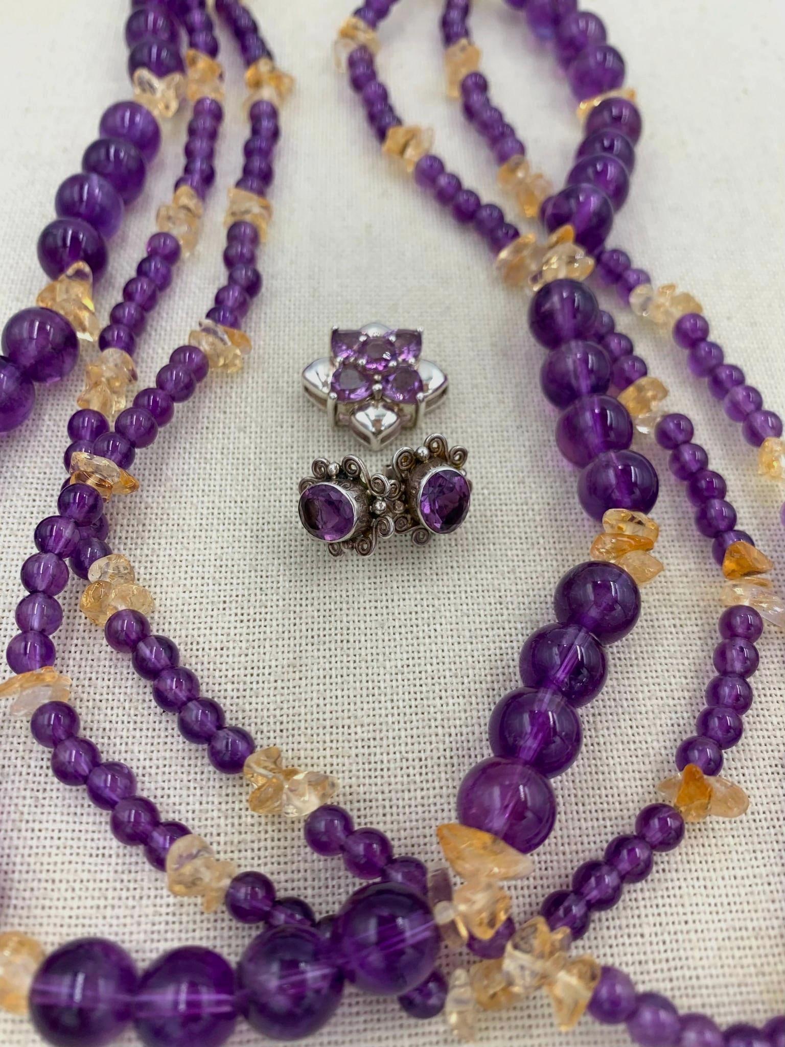 Amethyst and Citrine Necklace, 925 Amethyst Pendant & Sajen Silver Amethyst Earrings: * Raven silk cord (can be knotted for varied necklace lengths), 10mm to 5mm Amethyst beads, tumbled Citrine, triple strand, 38in34; circumference * 925 heart shaped faceted Amethyst pendant, 7/8in34;,