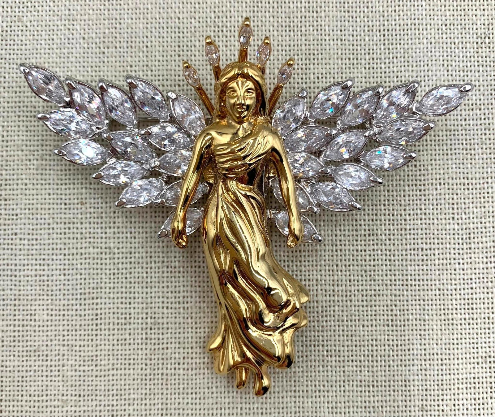 16 pc Nolan Miller, Kirks Folly, Glittering Rhinestone Christmas Holiday Jewelry Collection: Outstanding large sized 3 1/8" width Nolan Miller angel brooch, vintage Mid Century baby blue bells, oversize rhinestone tree pendant, sparkling snowflake earrings and pendant, Kirks Folly necklace, c