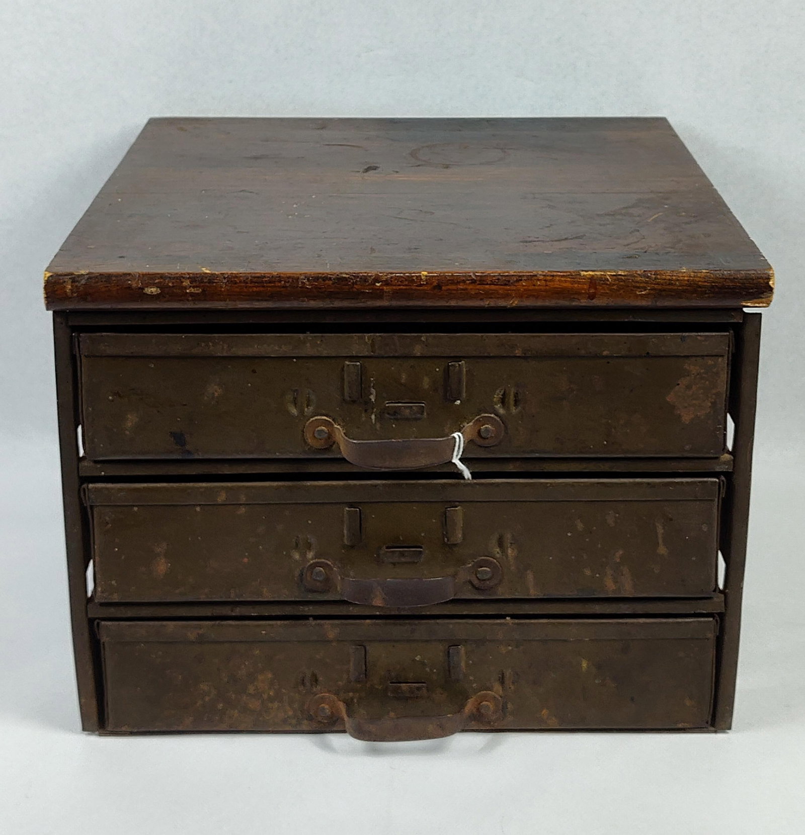 Mid-20th C. Industrial 3-Drawer Cabinet: 12x11.5x8.5 This tabletop industrial parts cabinet features three drawers and was designed for organizational use in a workshop or office environment. The unit is constructed with a thick, solid