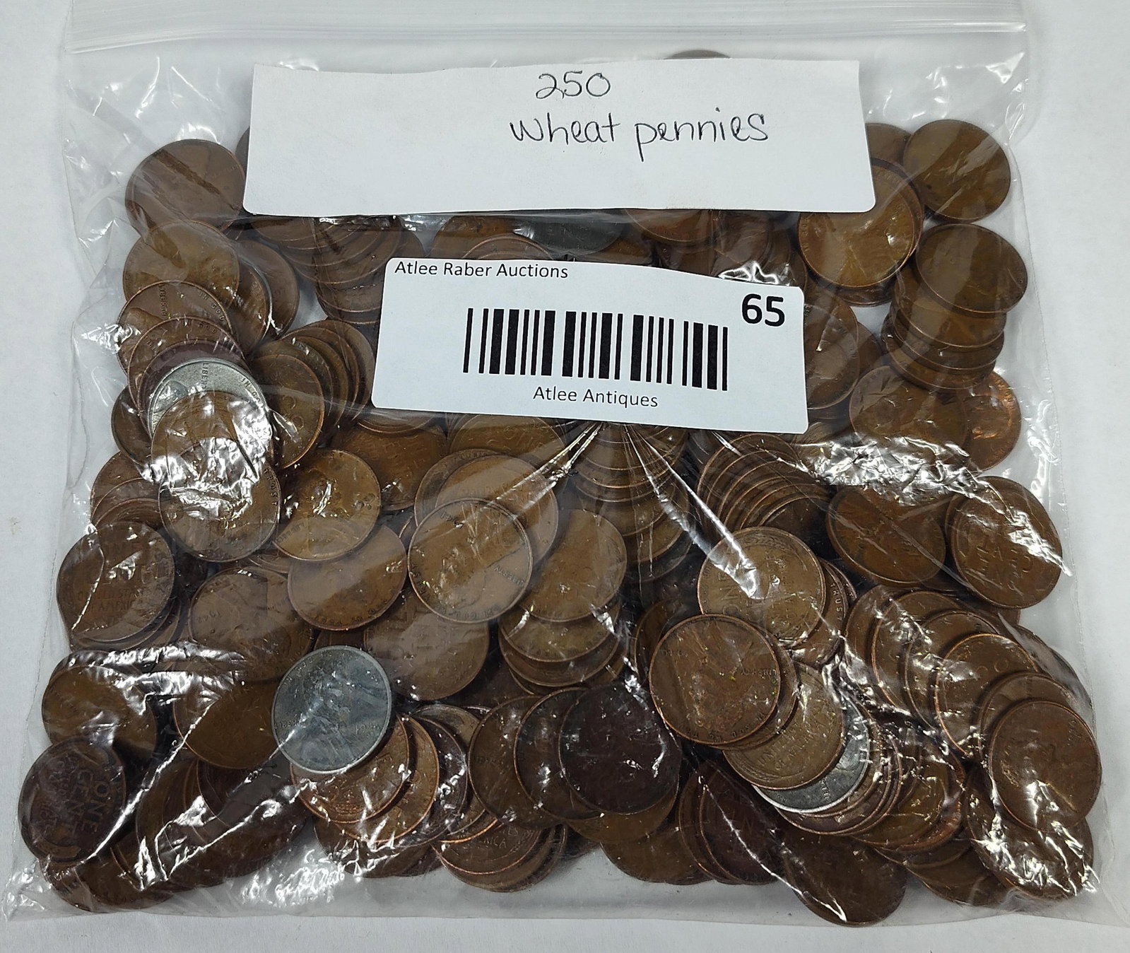 250 US Lincoln Wheat Cents: A collection of 250 US Lincoln one-cent coins, commonly known as Wheat pennies, housed in a clear plastic bag. The collection features the Lincoln profile obverse and the wheat stalk reverse design.