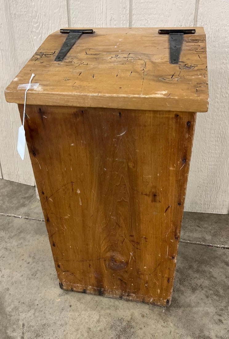American Primitive Slant-Top Wooden Bin: 28.5x14.5x14.5 A primitive American Country style storage bin constructed from heavy softwood planks, possibly pine. The exterior features a warm brown finish and a tall, narrow form with a slightly