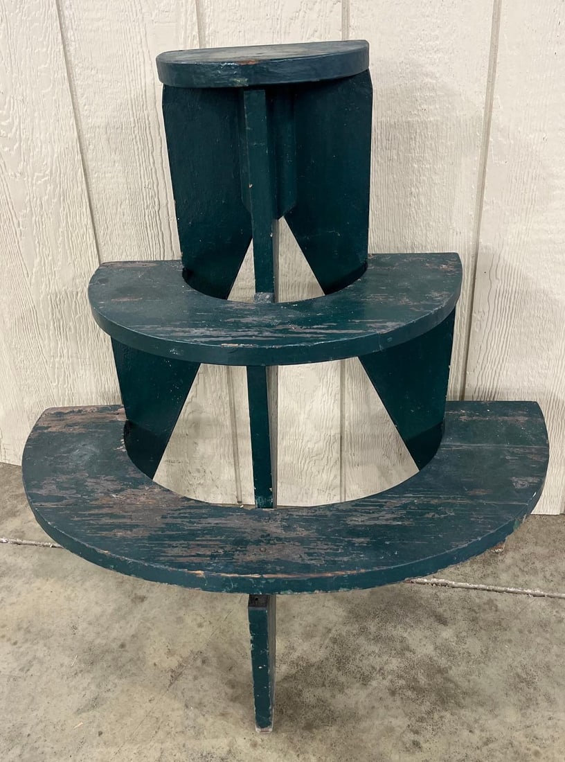 Primitive 3-Tier Painted Pine Stand: 30x31x17 A primitive three-tiered demilune display stand, likely intended for use as a plant stand. The piece is constructed from painted pine with a flat back for wall placement. It features three se