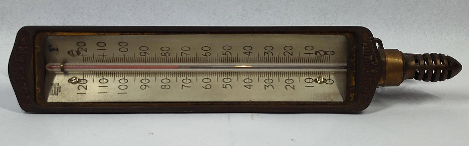 Moeller Industrial Spirit Thermometer: 13x2.5 This vintage industrial spirit thermometer was manufactured by the Moeller Instrument Company of Richmond Hill, New York City. The instrument features a heavy cast metal frame, likely brass or