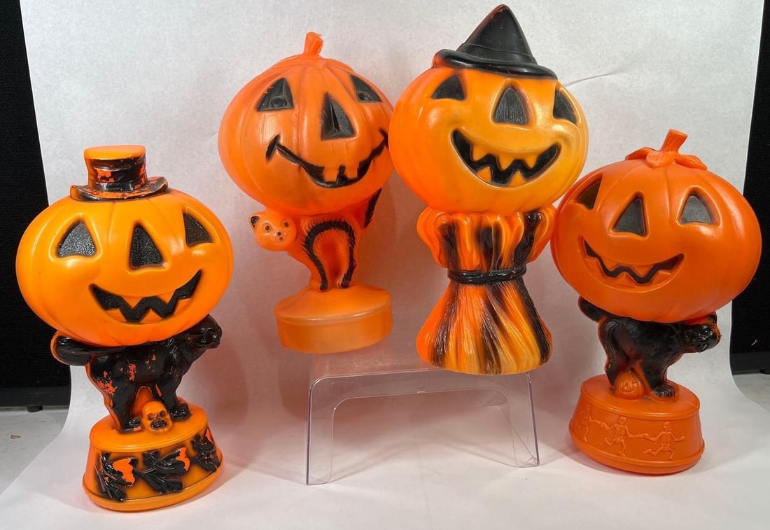 Empire Vtg Halloween Blow Mold Lanterns: Each is 15 in. A collection of vintage Halloween blow mold tabletop decorations manufactured by Empire Carolina Corp. These items are constructed from molded orange plastic with painted black
