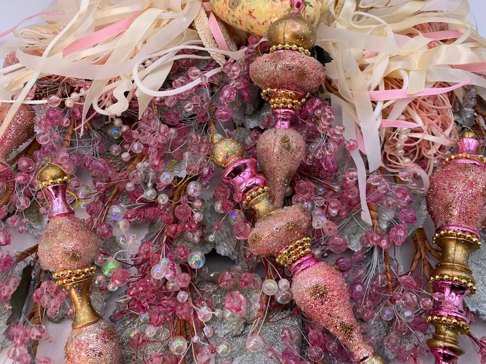 Vtg Blown Glass & Porc. Doll Ornaments: This collection features a diverse group of holiday ornaments including blown glass pieces, porcelain-headed figures, and decorative floral elements. A significant portion of the glass collection is p