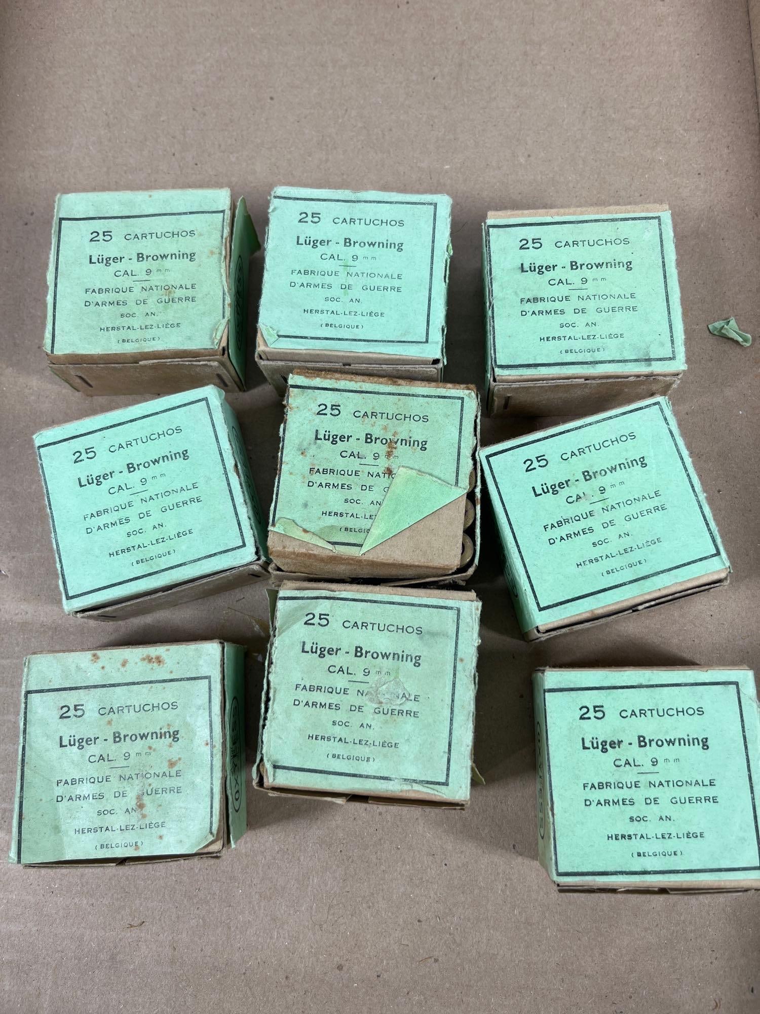 FN Luger-Browning 9mm Ammunition 1947: This lot consists of nine boxes of vintage ammunition manufactured by Fabrique Nationale d'Armes de Guerre in Herstal, Belgium. The cartridges are chambered for 9mm Luger and are composed of brass
