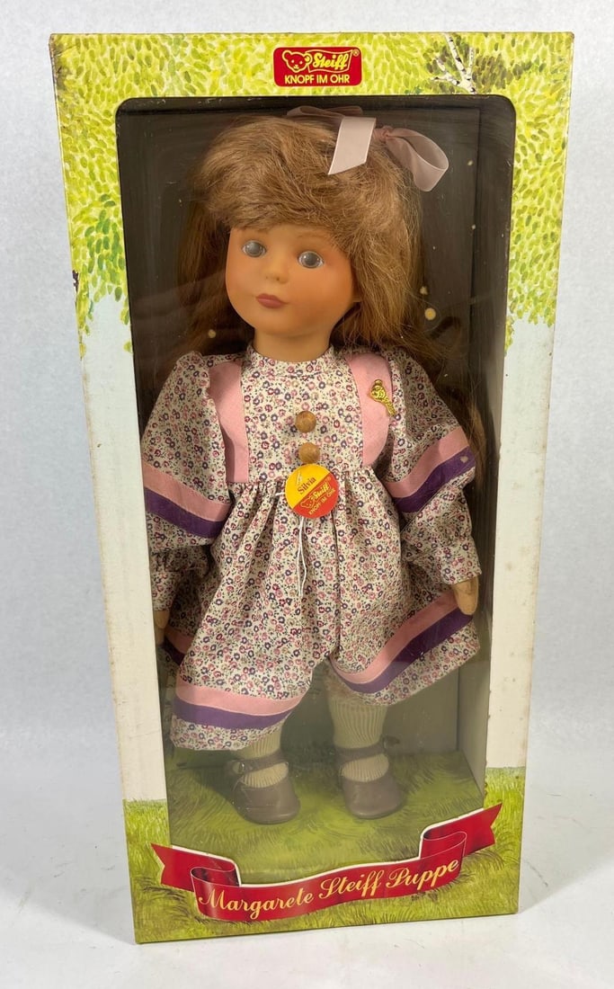 Steiff Silvia Artist Doll, Original Box: This is a Margarete Steiff Puppe known as Silvia, a collectible doll manufactured in Germany. The doll features a matte-finished vinyl head with inset, stationary brown eyes, painted lashes, and a lig