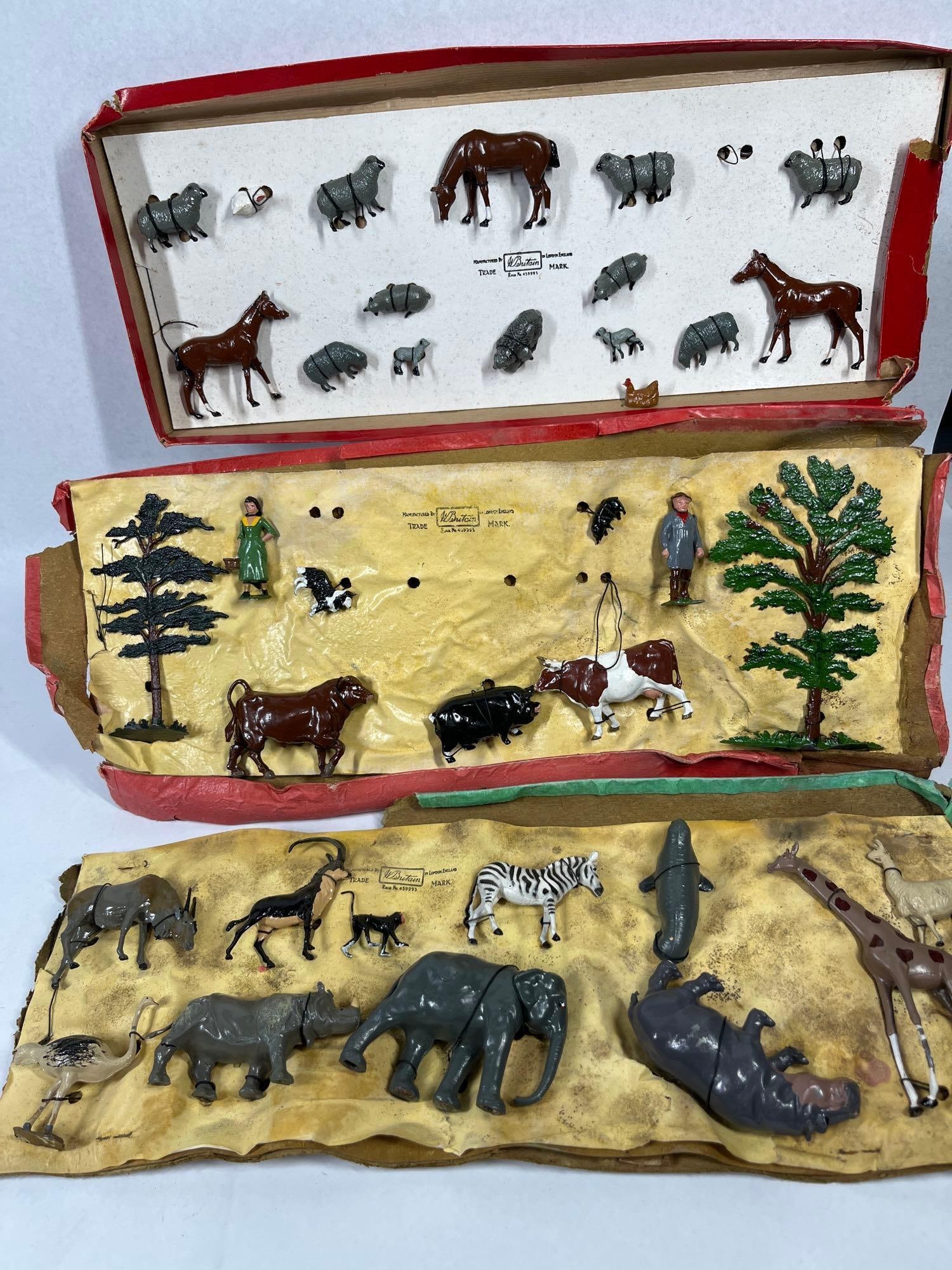 W. Britain Vtg Lead Farm & Zoo Figures: This group of vintage hand-painted hollow-cast lead figures and scenery was manufactured by W. Britain in London, England. The collection comprises components from two separate sets identified as the