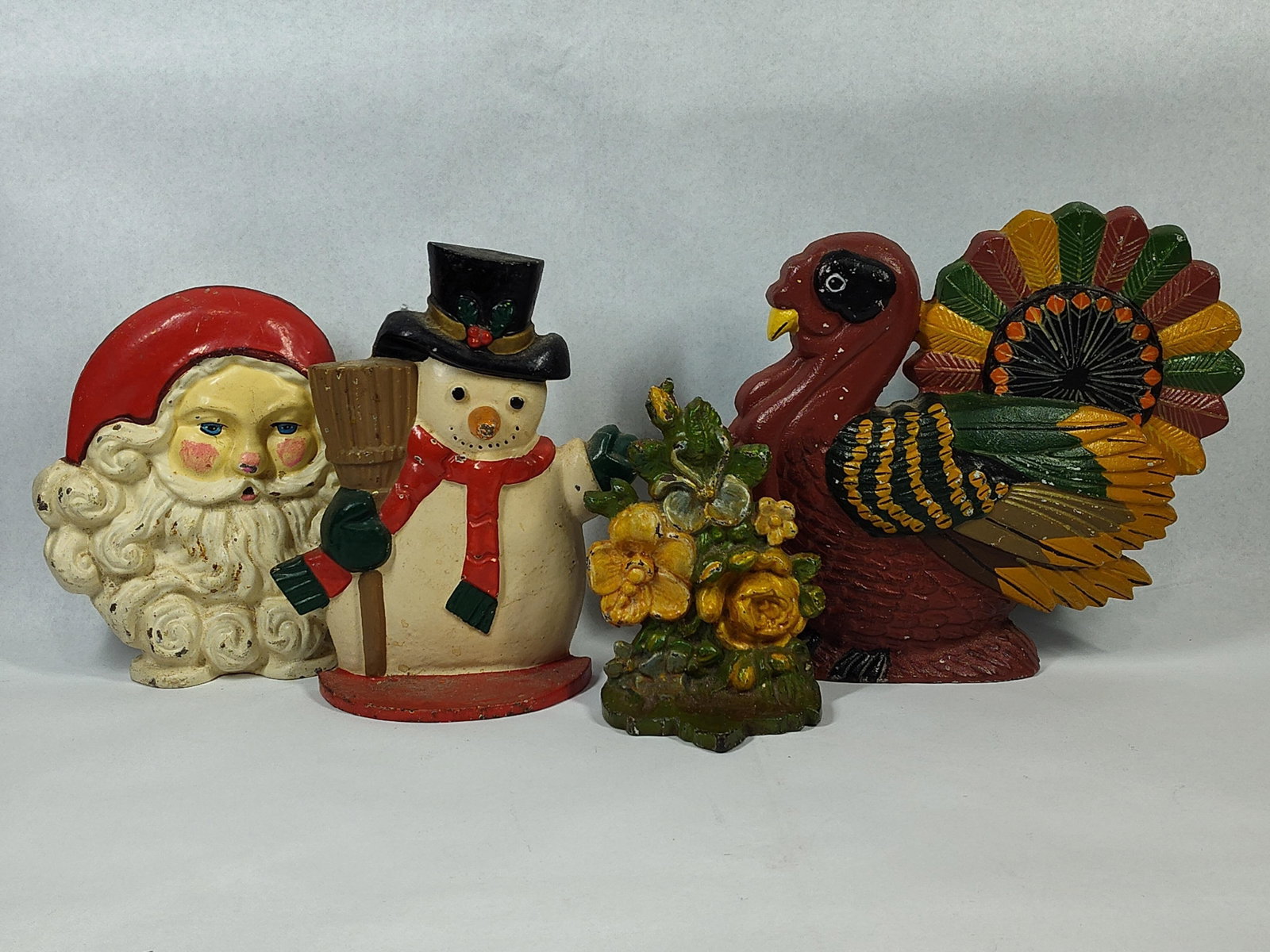 Holiday & Floral Cast Iron Doorstops (1 of 6)