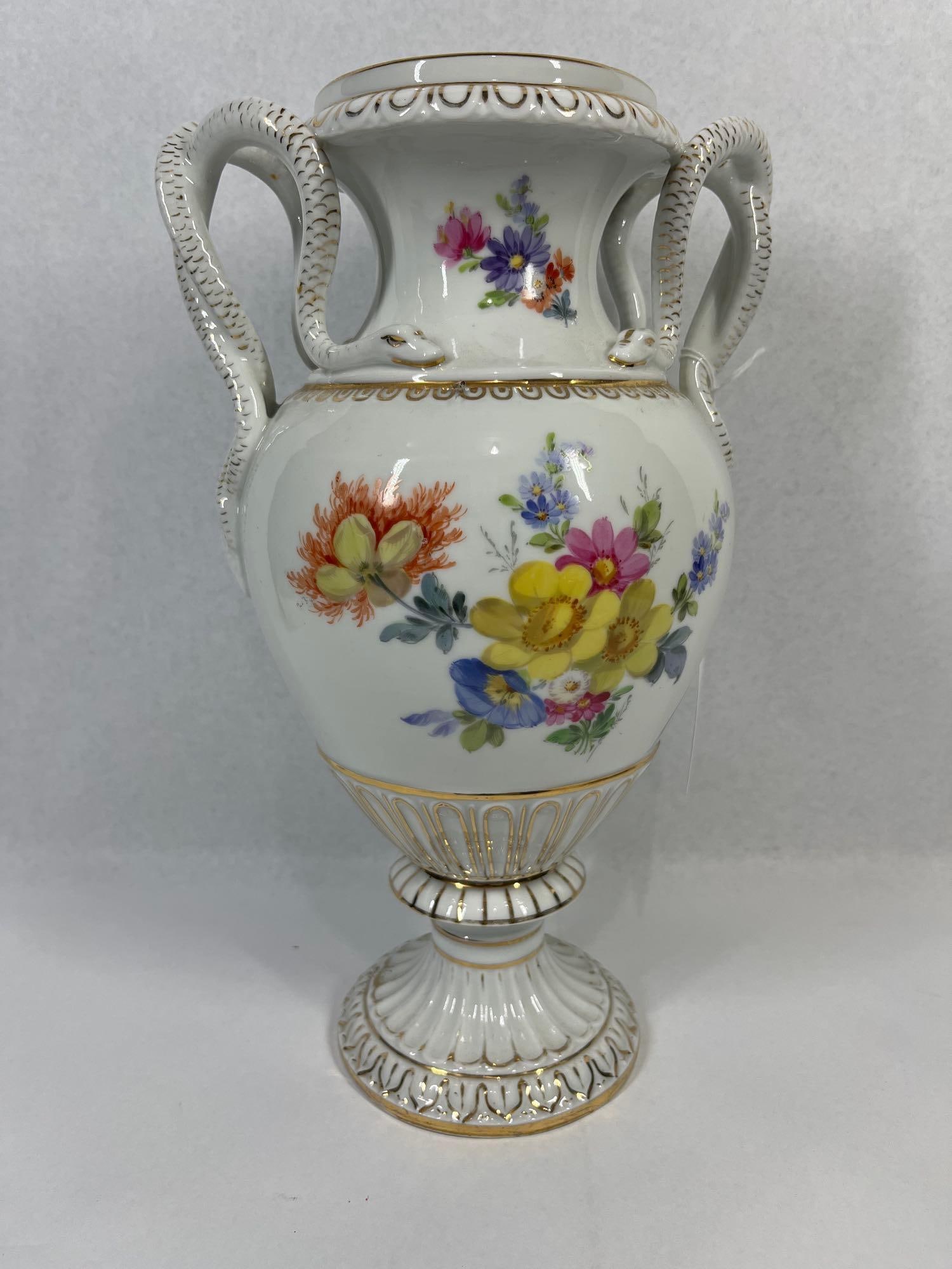 Teichert Meissen Porc. Snake Handle Urn: 12 inches. A German porcelain pedestal urn manufactured by Carl Teichert, Meissen. The neoclassical vessel features a white glazed body decorated with hand-painted polychrome floral arrangements inclu