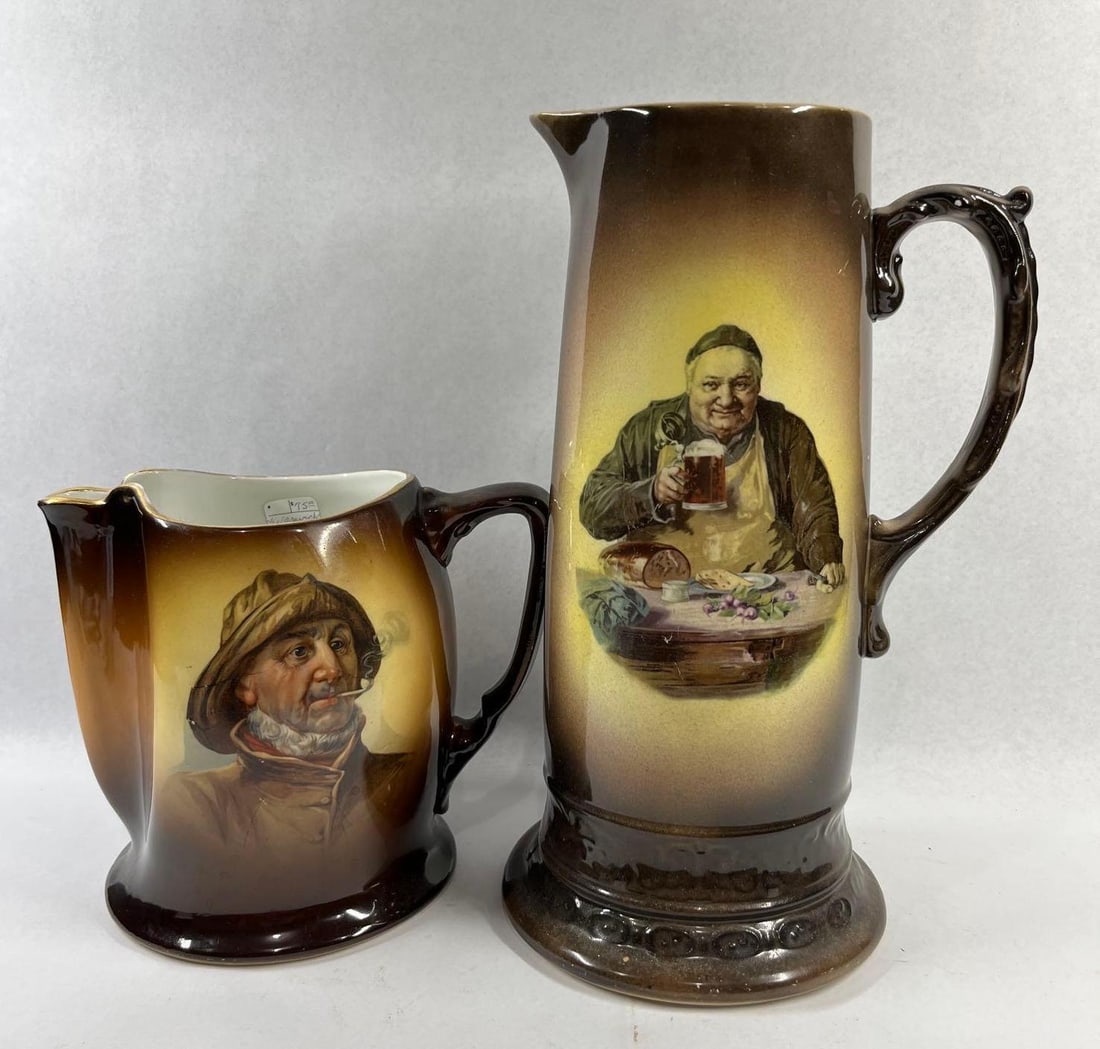 Warwick Ioga Portrait & Tavern Pitchers: 7 and 12 in tall. This lot features two glazed ceramic pitchers produced by the Warwick China Company of Wheeling, West Virginia, from their early 20th-century Ioga line. The smaller pitcher is a