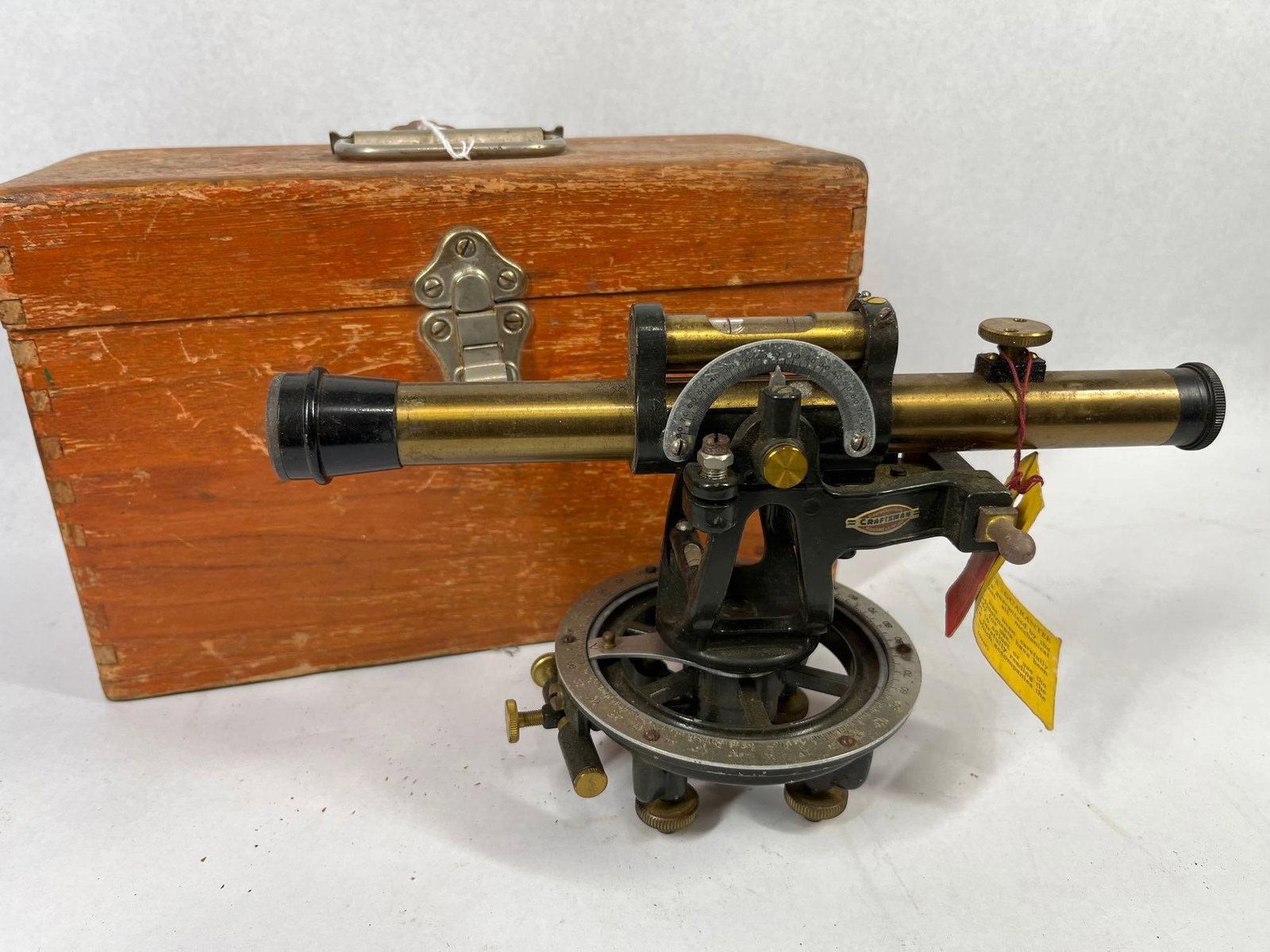Vtg Craftsman Surveyors Transit Level: This vintage surveying instrument is a transit level produced for the Craftsman brand, a line historically sold by Sears, Roebuck and Co. The device is constructed on a black-painted cast metal frame