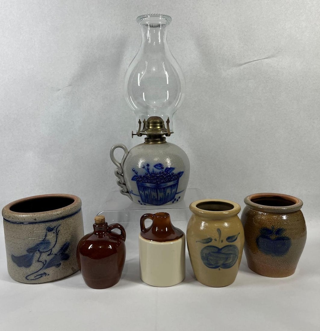 Rowe Pottery & Sterner Stuff Stoneware: Range 4.5 - in. Oil lamp is 14.5 in. This assortment consists of multiple pieces of contemporary salt-glazed stoneware, primarily featuring cobalt blue folk art decorations. Included is a cylindrical 