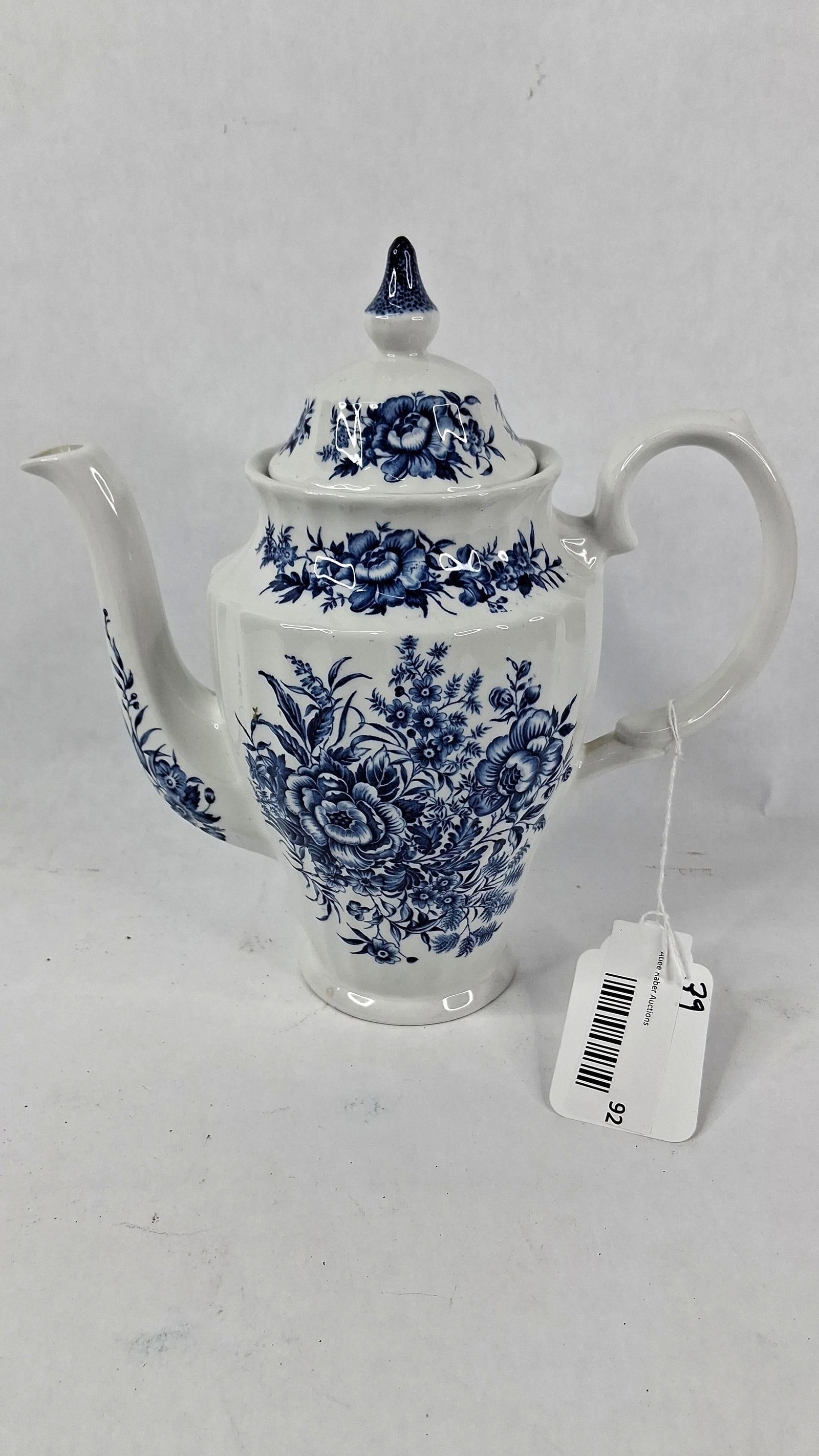 British Anchor Beacon Hill Coffee Pot: 9.5 in tall A British Anchor Staffordshire ironstone coffee pot in the Beacon Hill pattern. The vessel features an octagonal faceted body and a high-arched spout. The scrolled handle is designed with 