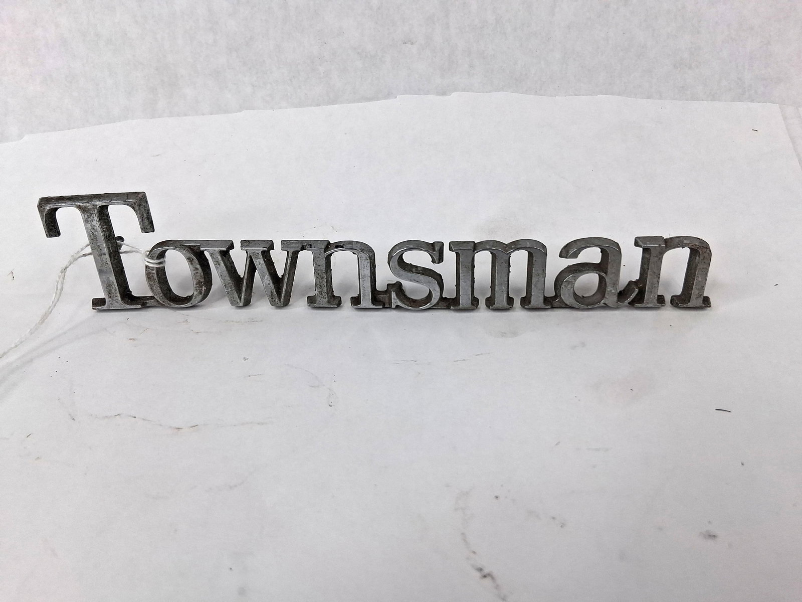 1969-72 Chevrolet Townsman Wagon Emblem: This is an original equipment manufacturer (OEM) automotive exterior script emblem for a Chevrolet Townsman station wagon, dating from approximately 1969 to 1972. The emblem consists of the word