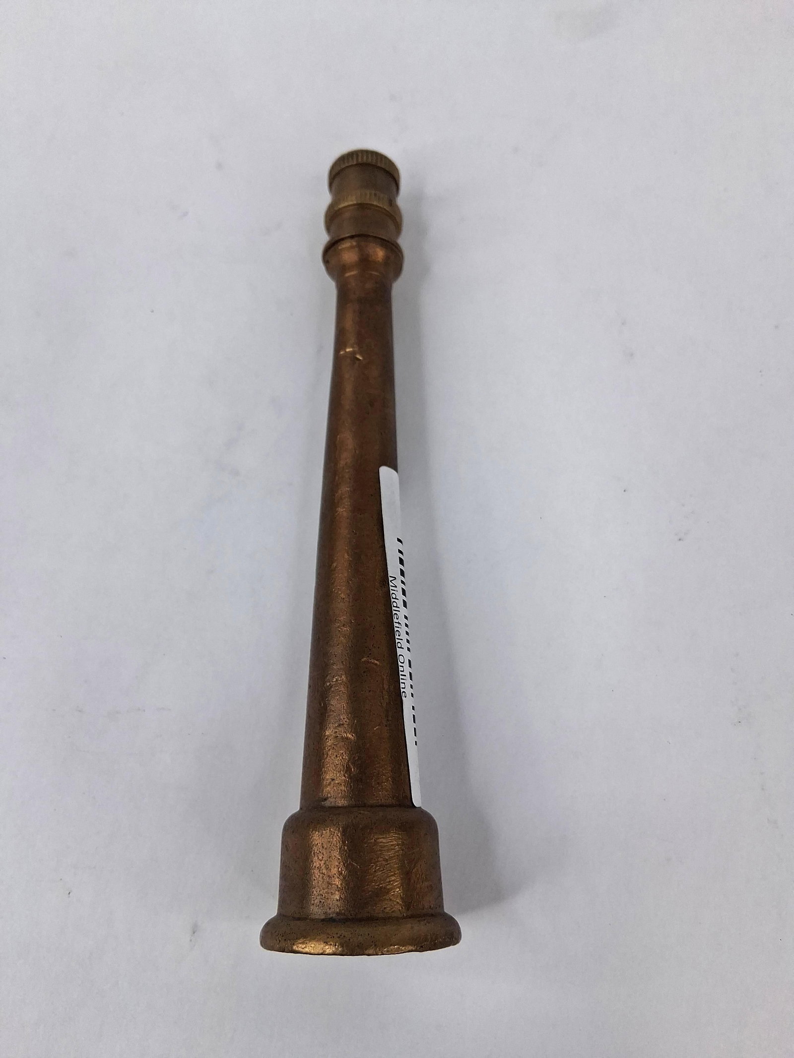 Vtg Solid Brass Garden Hose Nozzle: This garden hose nozzle is constructed from solid machined and cast brass. It features a classic long, tapered barrel design typical of mid-20th-century American hardware. The nozzle is composed of