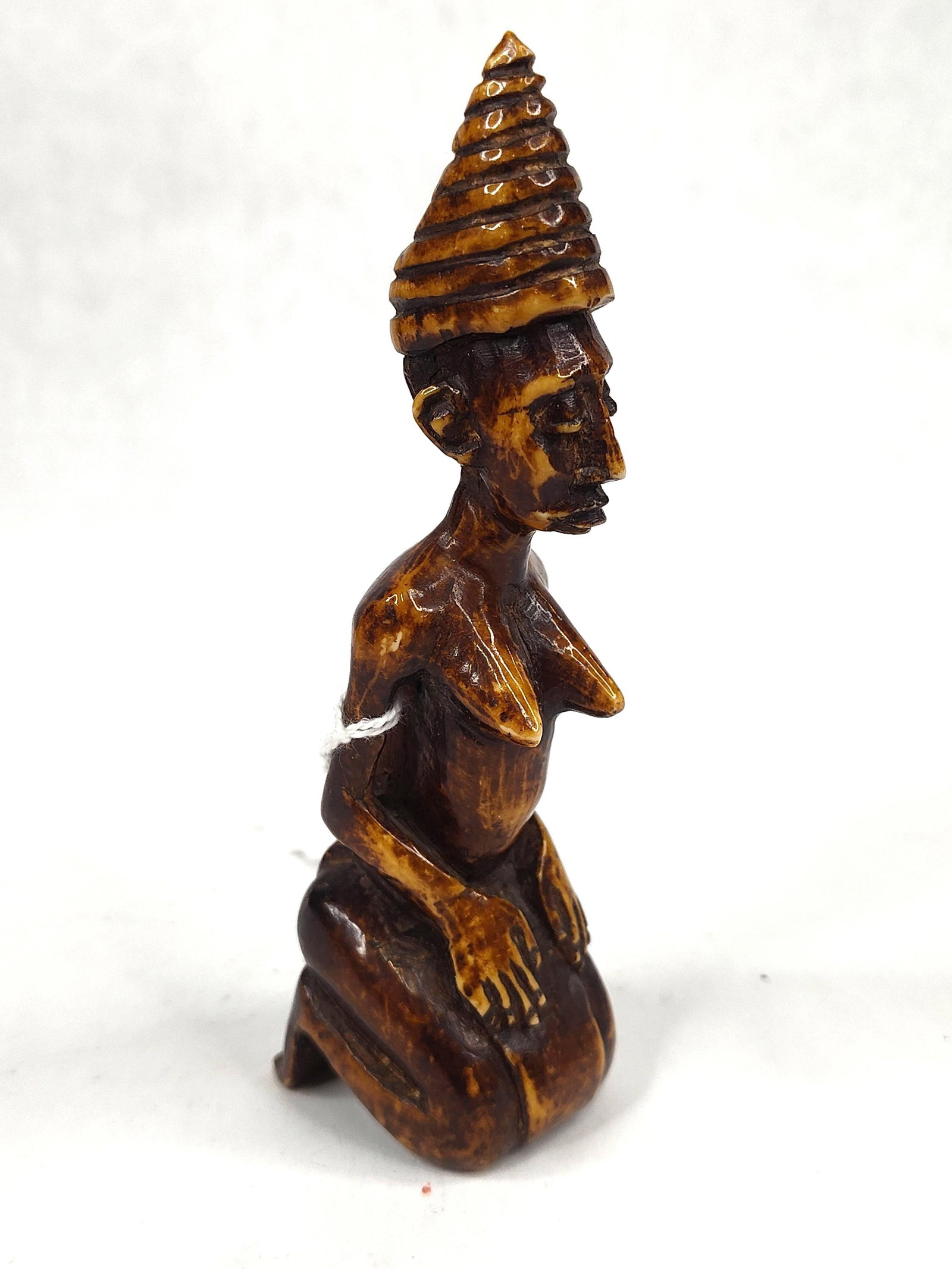 Central African Bone Kneeling Figure (1 of 5)