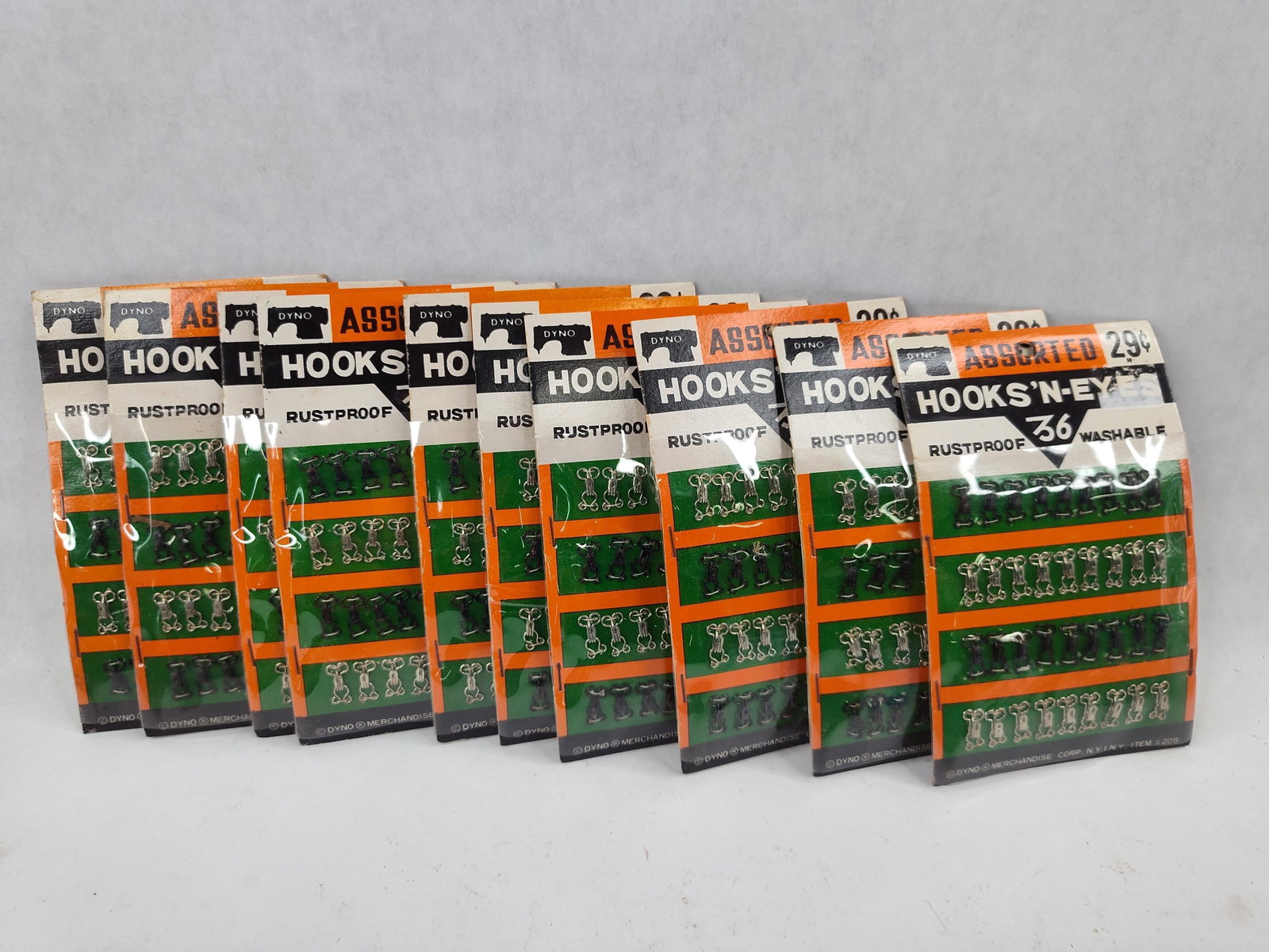 Vtg Dyno Merchandise Hooks & Eyes Cards: Nine retail packs of Assorted Hooks 'n-Eyes produced by Dyno Merchandise Corp., New York, NY. These items are original new old stock (NOS), each containing 36 rustproof and washable metal fasteners