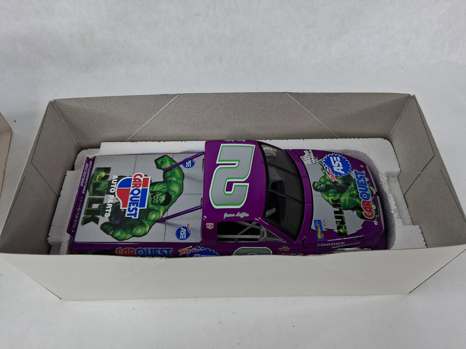 Action Racing Leffler 2003 Hulk Truck: This is a 1:24 scale model of the number 2 Dodge Super Truck driven by Jason Leffler during the 2003 NASCAR Craftsman Truck Series. Produced by Action Racing Collectables, the model features a