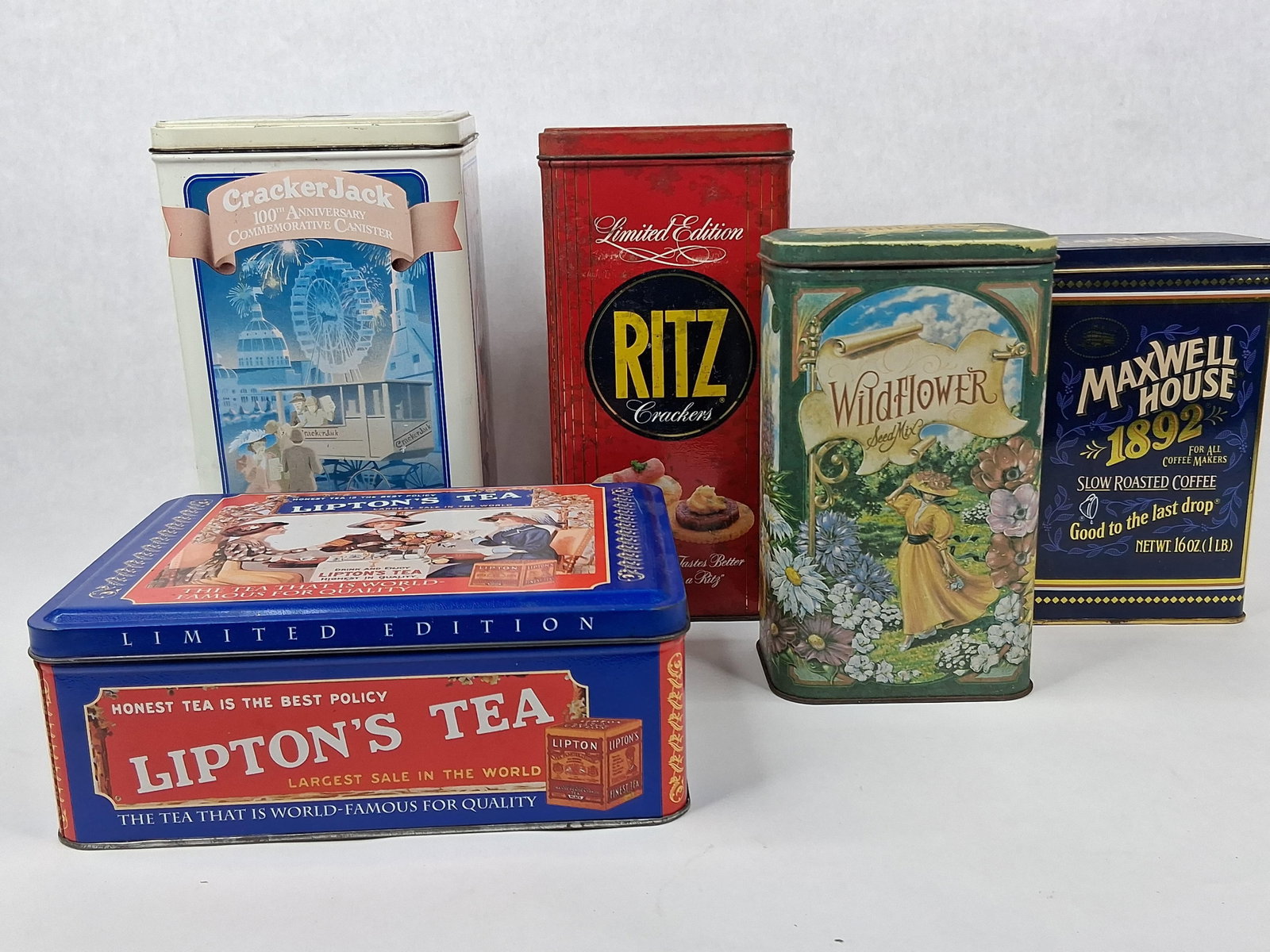 5 American Food Brand Advertising Tins: This collection consists of five lithographed advertising tins featuring iconic American food and beverage brands, primarily issued as limited edition or anniversary commemoratives during the late 198