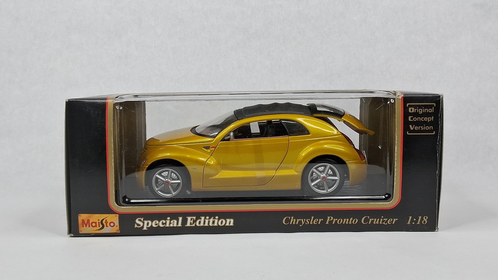 Maisto Chrysler Pronto Cruizer Concept: This 1:18 scale die-cast model car represents the Chrysler Pronto Cruizer in its original concept version, produced by Maisto as part of their Special Edition series. The vehicle is constructed from d