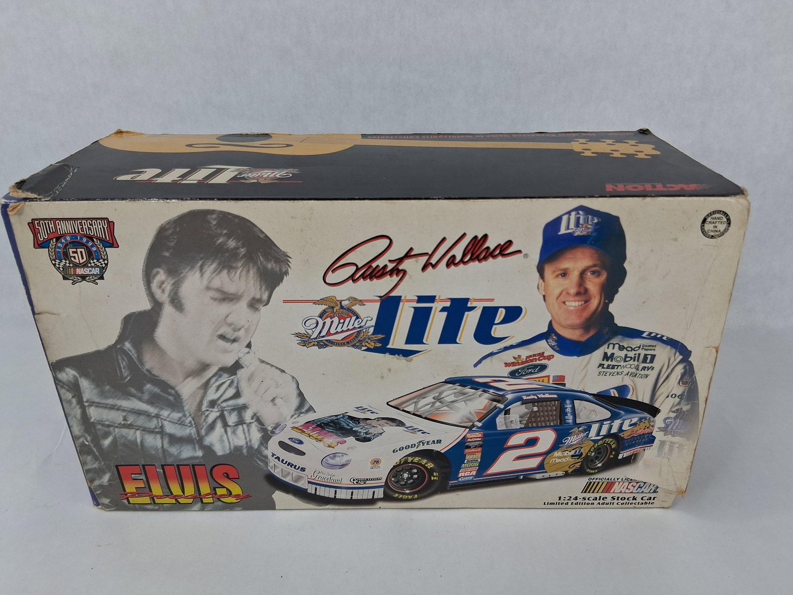 Action Rusty Wallace Elvis Die-Cast Car: An Action Racing Collectables 1:24 scale die-cast replica of Rusty Wallace's #2 Ford Taurus stock car. This limited edition model features a special Miller Lite and Elvis Presley "Viva Las Vegas"