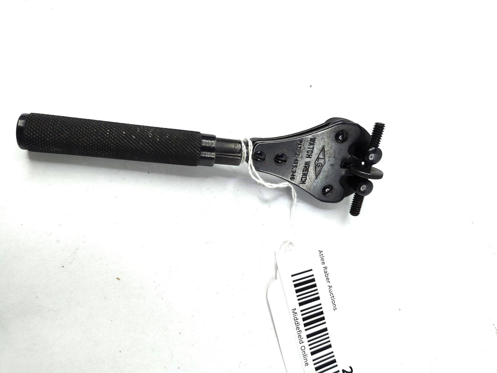 LG Tools Vtg 3-Point Watch Case Wrench: A professional watchmaker tool by LG Tools designed for opening waterproof screw-down watch case backs. This three-point adjustable wrench is constructed of steel with a black oxide finish and