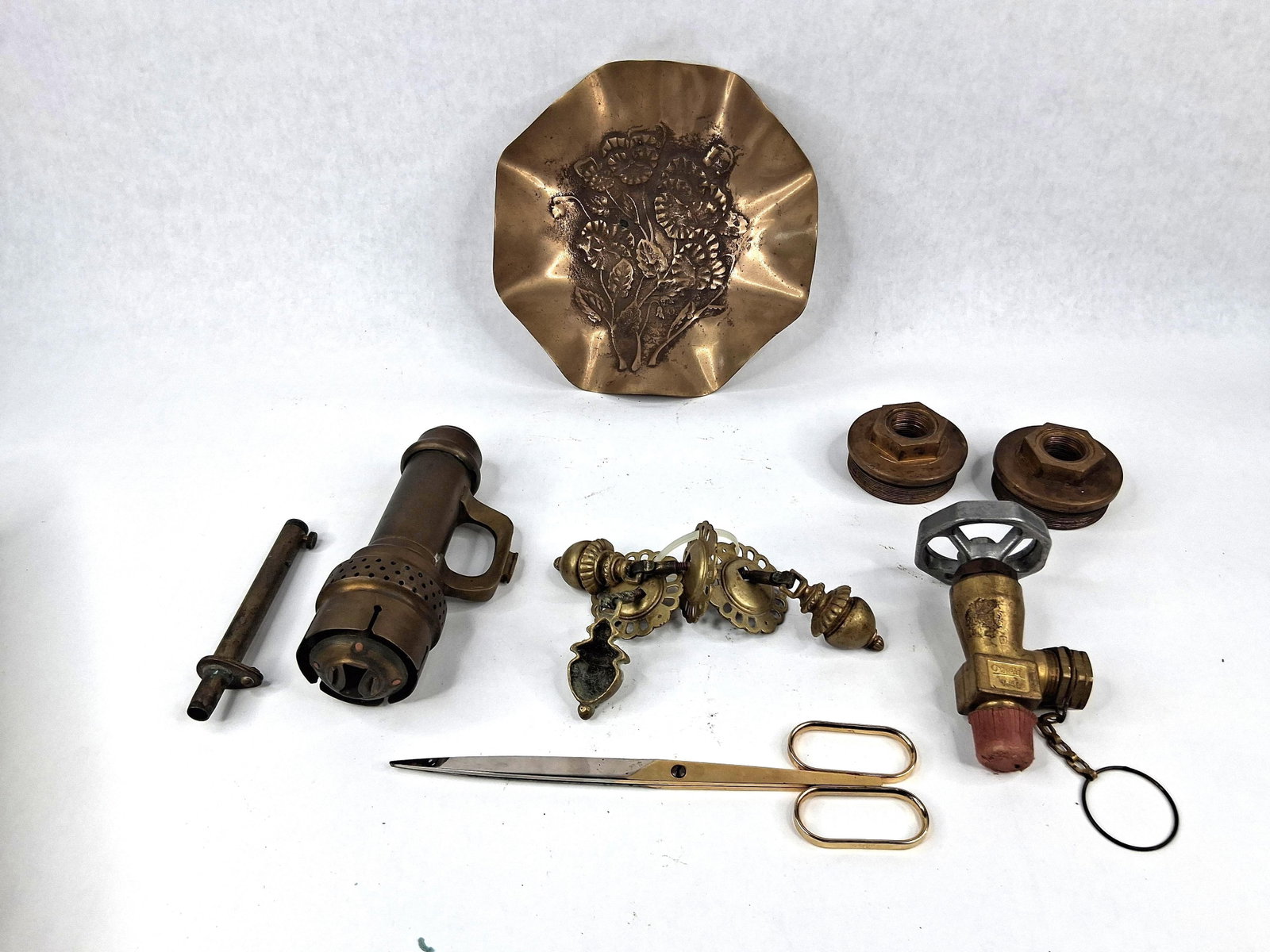Oxweld Gas Valve & Industrial Brassware: This collection comprises an assortment of industrial components, decorative hardware, and utility items primarily constructed of brass and steel. The lot features a signed Oxweld industrial gas regul