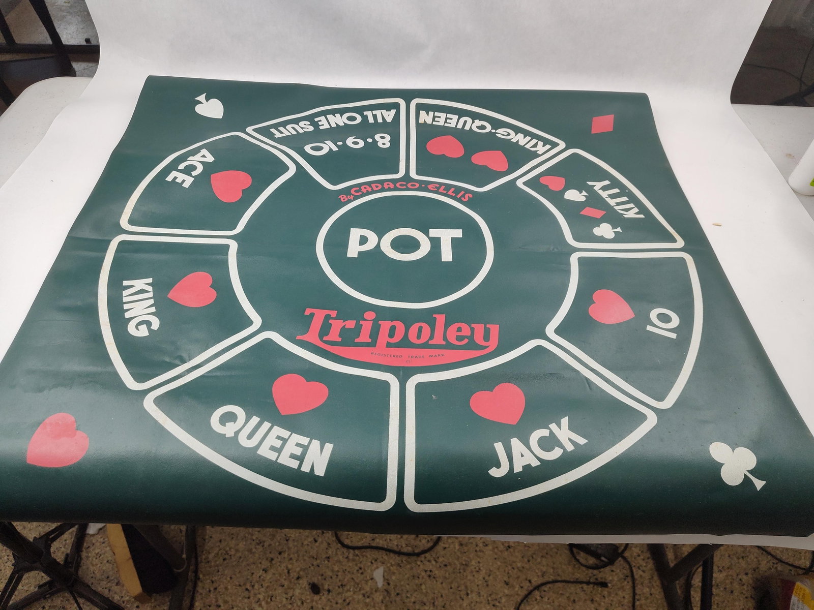1962 Cadaco-Ellis Tripoley King Game: A 1962 King Edition Tripoley game layout mat and original box produced by Cadaco-Ellis, Inc. The set features a large-format printed game mat, model number 250, and its original cardboard storage
